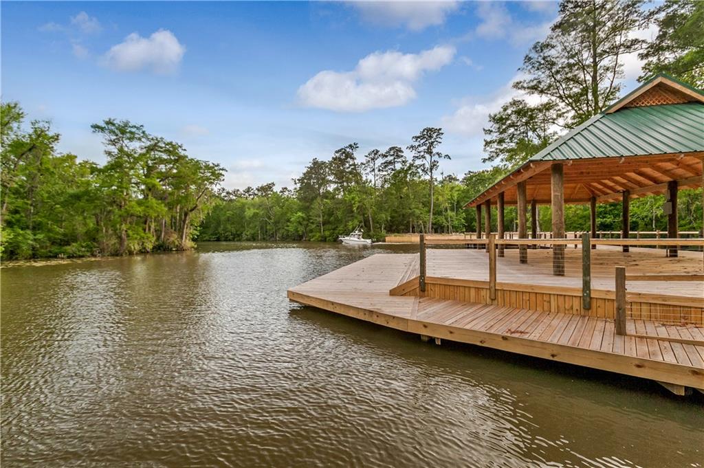 Highly desirable new addition to the Northshore! A gated, waterfront community nestled on the beautiful Tchefuncte River in Covington. This brand new development will make you feel away from it all, although it is right by all of the shopping, dining and conveniences you love! River Club will include a private marina with covered boat slips and pavilion overlooking the water. Easy access to I-12 and only minutes away from the Causeway Bridge. Lot 85 fronts Tchfuncta River.