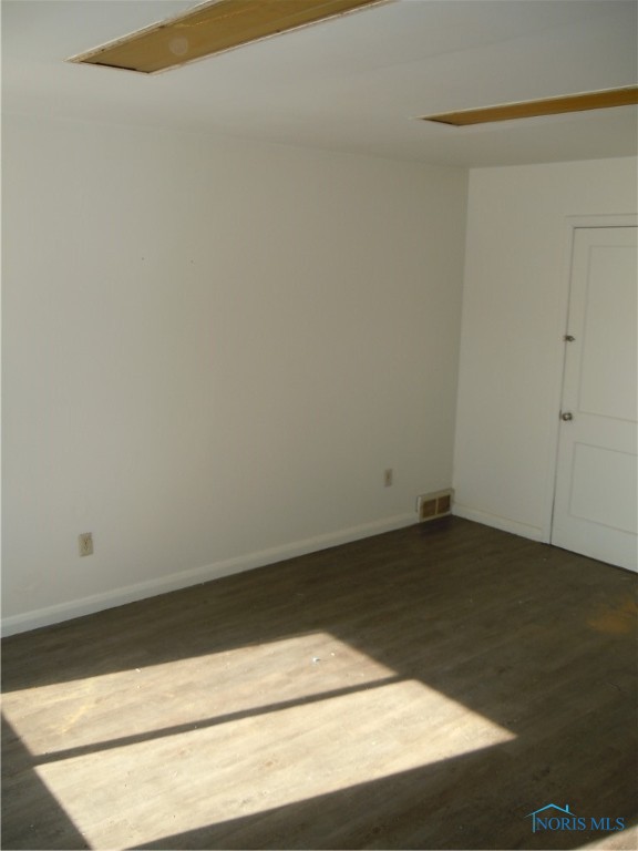 Bonus room for possible exercise room or office with new vinyl flooring.