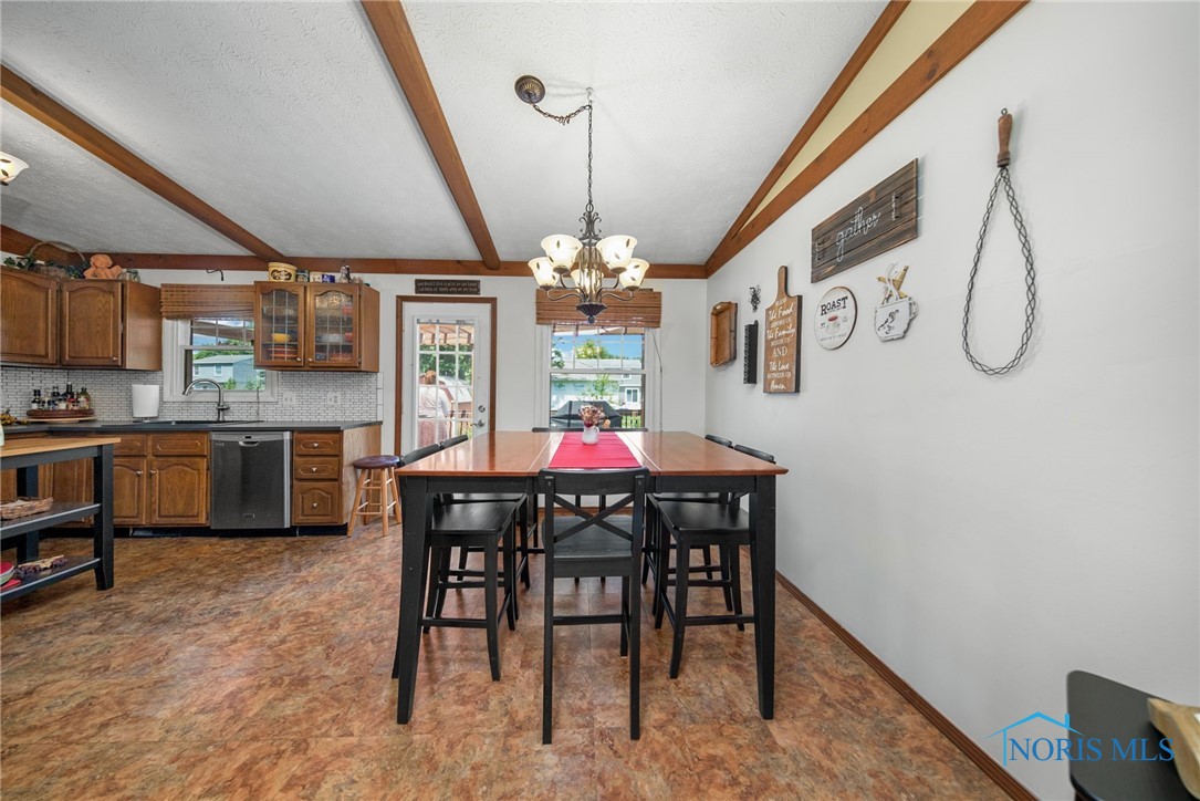 Large dine-in kitchen with tile flooring.