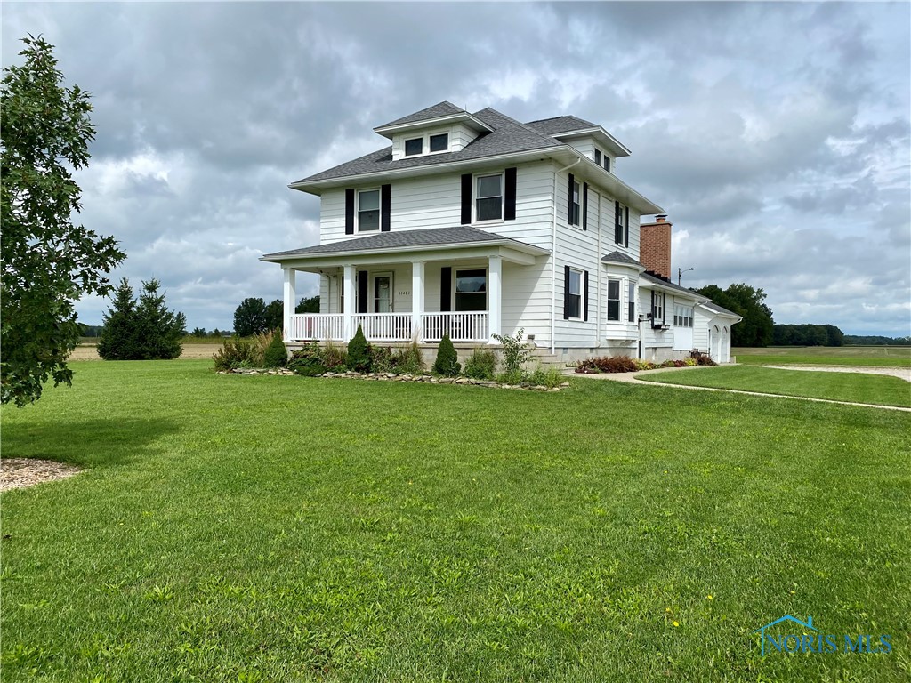 The character of a 1900s farmhouse w/the perfect modern touches! The 844 sqft ATTACHED garage has 12' ceilings! The HUGE kitchen is magazine worthy w/granite, barstool seating, soft-close shaker cabinets & elec fireplace! Master bed/bath on 1st flr! 3 bds & office upstairs. Plus a 19x27 insulated 3rd flr w/mini-split. (Drywall needs finishing.) 2 acres surrounded by farm fields. What a peaceful setting! 288 sqft shed built in 2018. 7 mini-splits to heat/cool. ~2004 foundation & septic. From the inviting covered front porch to the spacious utility rm, you'll love every detail! Plus public H2O!