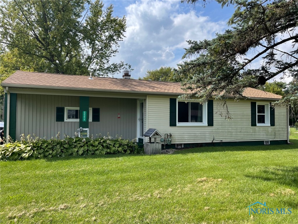 Completely updated ranch house in Genoa with three bedrooms and two full bathrooms! Living room AND a family room.  Two-car attached garage.  Huge yard!