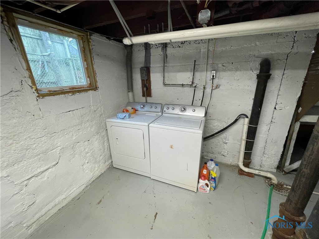 washer and dryer in basement