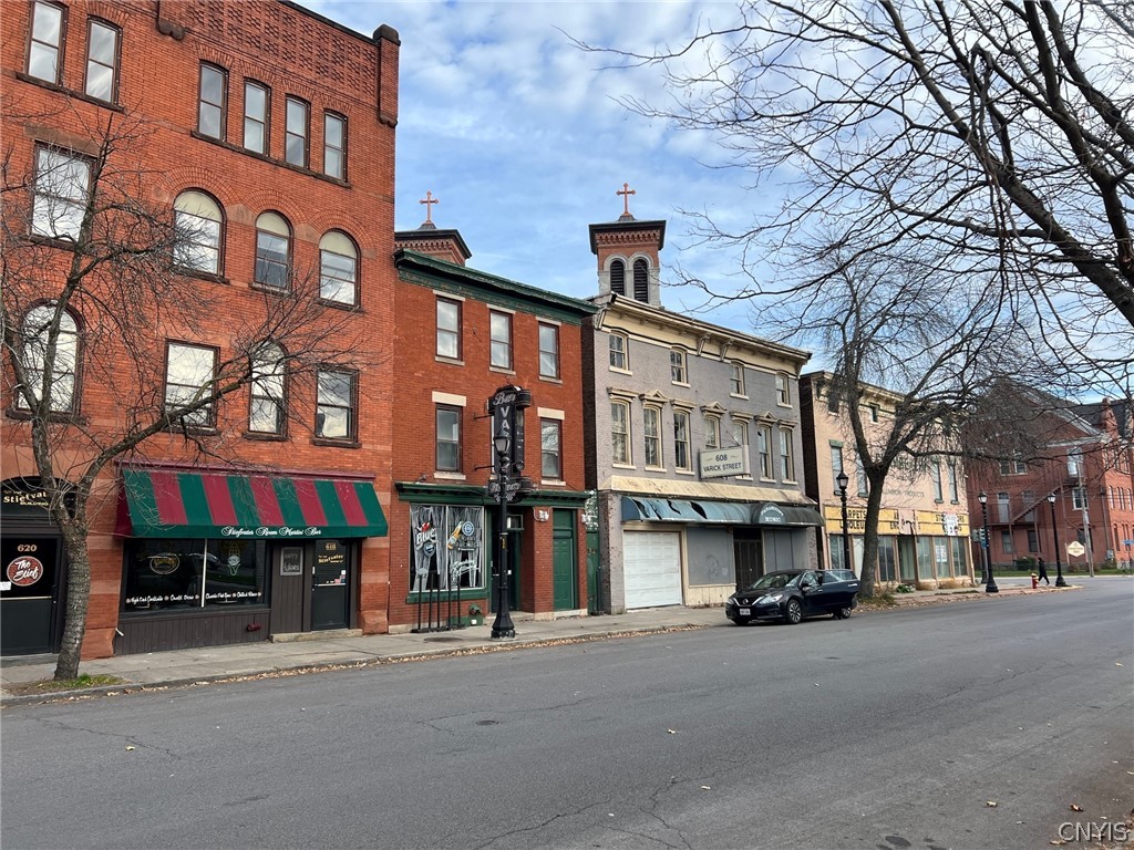 Three stories of great potential. Building is currently is bar on first floor. 

Property being sold as a whole with two other parcels that convey with sale. Parcels will not be sold separately. The sale includes MLS #'s S1435226, S1435228 & S1435238 sold together for a combined price of $1,450,000.  Taxes are $2,690, $3,066 and $10,136 respectively for a total of $15,892.