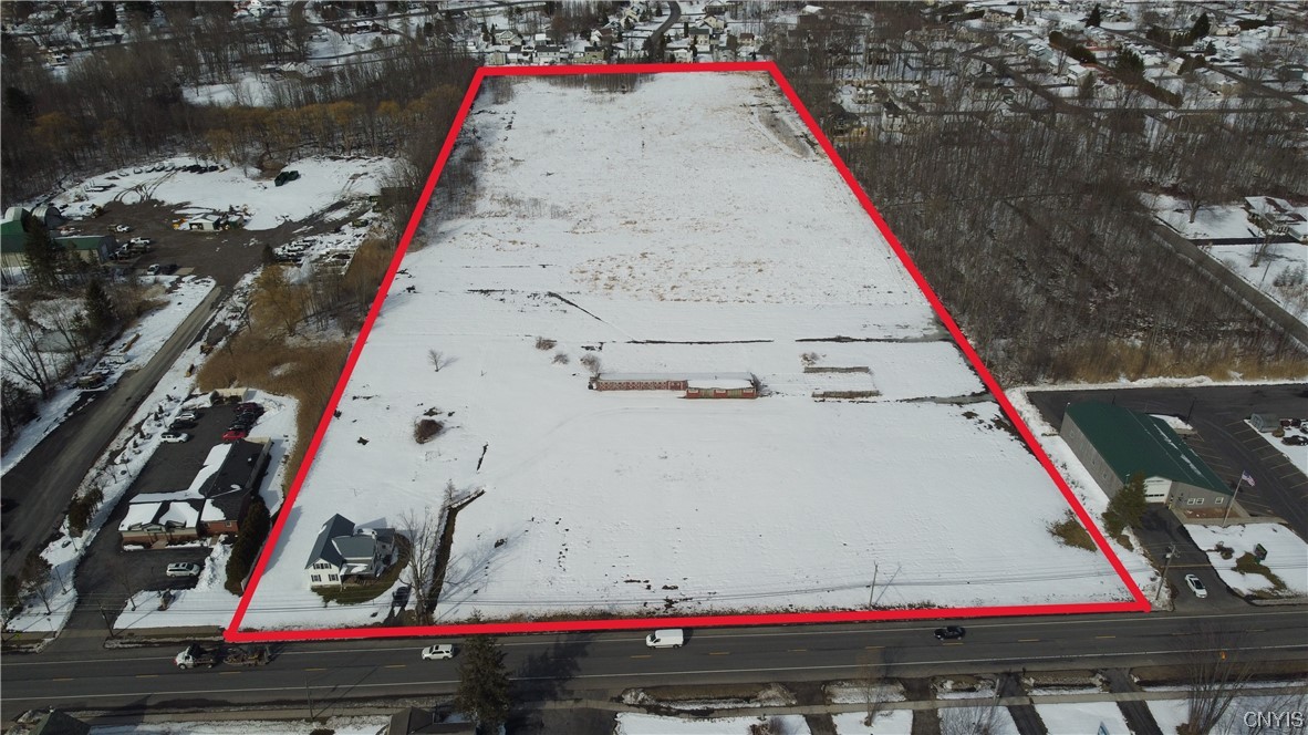 Wow! 15 Acres of prime commercially zoned Real Estate on State Route 31 in the heart of the Cicero just 4 miles from the Micron Microchip manufacturing plant and a quarter mile from CNS High School and Cicero Elementary School (the largest school district in Syracuse). This extremely flat 15 acre lot is zoned commercial, but could easily be subdivided into a commercial road facing lot with residential zoning behind it for a townhouse development or luxury housing! With an estimated daily traffic count of 12,796 on the 504 feet of NY-31 frontage, this lot sees among the most traffic in all of North Syracuse and that will only go up as Micron breaks ground! Don’t miss your chance to develop some of the most prime Real Estate is all of Upstate, NY!

(If navigating using Google Maps, use 6100 NY-31, Cicero, NY 13039 and it is the lot is across the street)