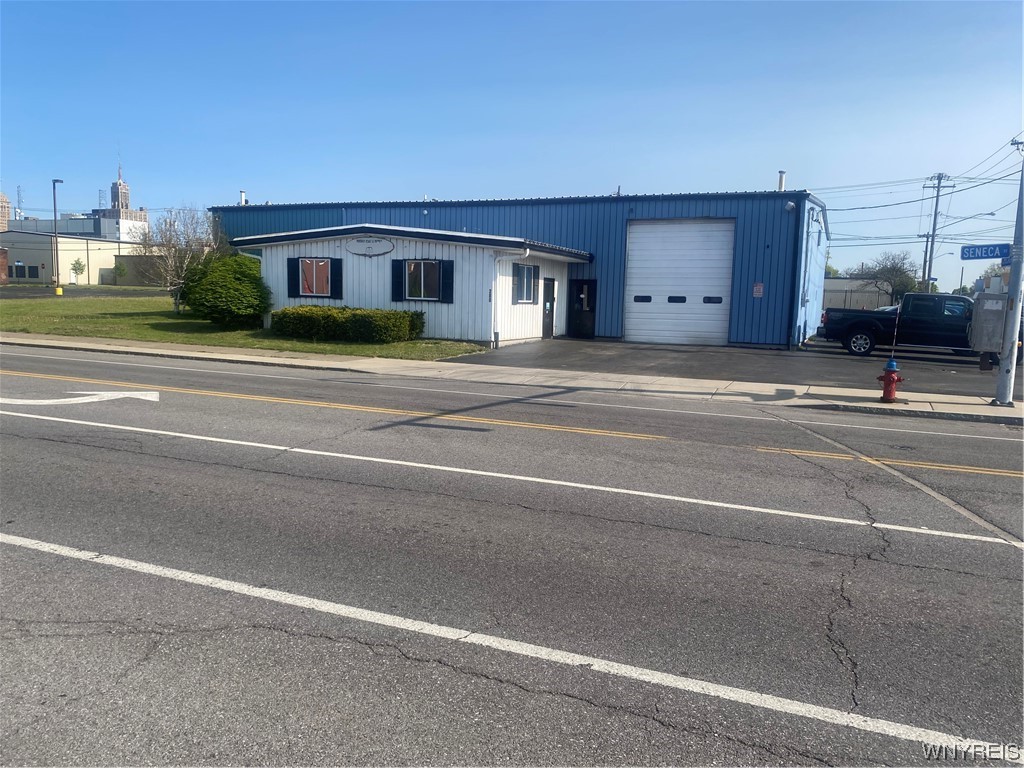 5,000+ square foot industrial building on 3/4 acre. Zoning allows for storage units or any industrial/commercial use.