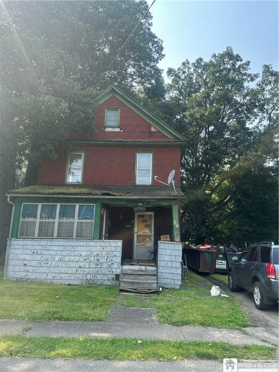 Handyman special on double lot near Prospect Elementary! This is a family home with 3 bedrooms upstairs and one downstairs. Hardwood floors upstairs and beautiful wood molding throughout. Bring your creativity and make this yours! Subject to Seneca Nations of Indian Lease Agreement.