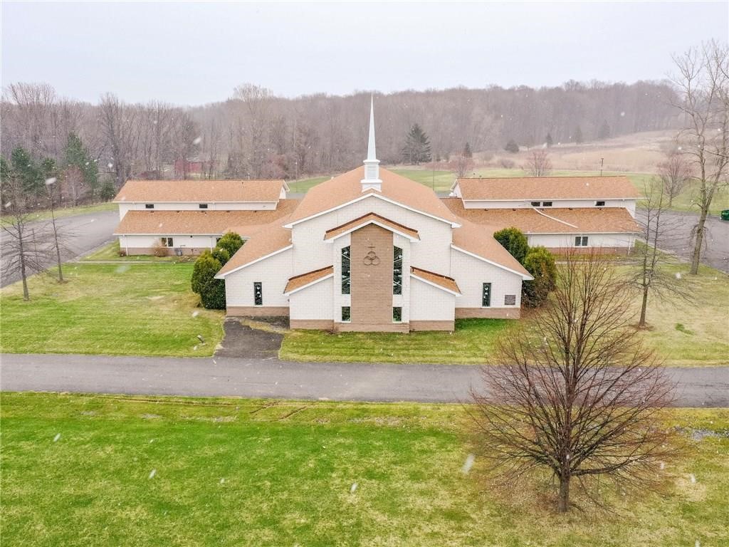 VIEW ATTACHED VIDEO! SPECTACULAR 18,172 SF BUILDING SET ON JUST OVER 10 COUNTRY ACRES. Currently being utilized as a church. The Town of Rush is open to various usage. Building features a large sanctuary, capable of seating up to 630 occupants - which would also make a great auditorium, complete with a multi-location monitoring system and large screen television. Balcony media room and soundproof nursery. Secondary instructional or gymnasium with his and her showers and baptismal or learning pool. Perfect for school, day care or college satellite classroom extensions. Spacious cafeteria with 200+ seating and a state-of-the-art stainless prep kitchen. Other possibilities could be a Synagogue, retreat, offices, daycare. Merge area congregations into one! Natural gas. Partial basement and attic. Central air.