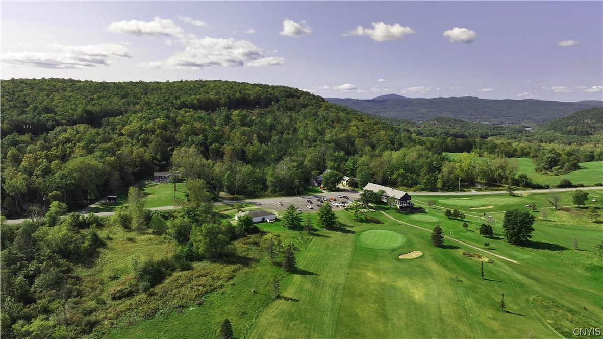 Tranquil 18 hole Public country club and Golf course. This spacious turn-key offering sits in the foothills of the Adirondack Mountains and midway between Lake George and Rutland, VT. The fairways and greens are kept in manicured conditions. The seasonal clubhouse and banquet space ( currently 120-person seating capacity ) could easily convert to a year round operation providing a great year destination site for weddings, corporate events, and outings. If you are seeking a golf course with banquet opportunities, this peaceful site is a must-see.  Continue the tradition that has been honed to a fine-tuned, profitable operation over multiple generations.