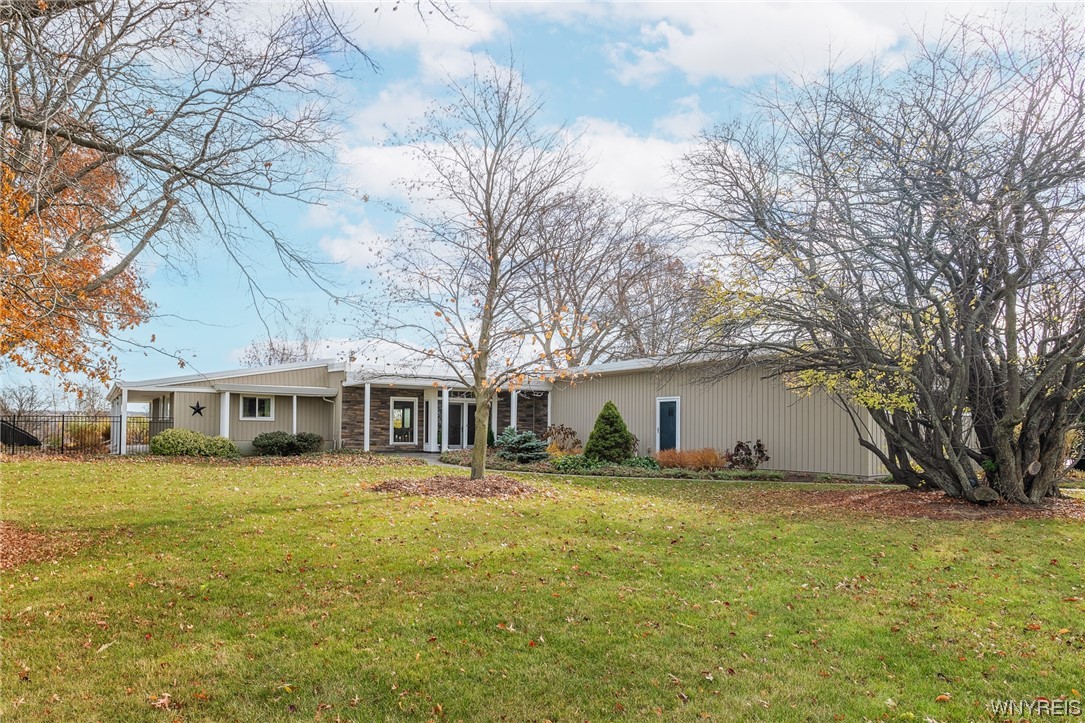 Architectural Designed Contemporary Ranch! 4+A (Includes adj 1.4A lot)! Cherry Kitchen, Quartz Counters & Island Bar opens to Din/Liv Rms w/Wall of Windows! French Doors open to New Sunroom (Enclosed for Yr-Rd use ‘22, adding 150+sqft to home)! Expansive LivRm w/Gas Fireplace PLUS Entertainment size GreatRm w/Lofted Tongue&Groove Fir Beamed Ceiling, Skylights & Gas Fireplace! Primary Suite w/Walk-in Closet, Custom Tiled Walk-in Shower, Cherry Vanity & Quartz Counter! Guest Bedroom & Bath also w/Tiled Shower, Cherry Vanity & Quartz Counter! 3rd Bedroom/Office w/Door Leading to Rear Yard & Covered Wraparound Concrete Porches to Enjoy the Panoramic Valley View! Stackable (1yr Washer)/Dryer off Bedrm Hallway! Fully Tiled Handicap Accessible 3rd Bath w/Floor Drain of Kitchen & Ample Pantry Closets! Radiant Heat Porcelain Tile Floors Thru-out! NAVIEN Boiler/Water Heater ‘23! Ductless AC Units in LivRm & Primary Bedrm, (7) Anderson Windows & RearYd Aluminum Fencing ALL in 2022! Hot-Tub 3yrs. Two Attached 2 Car Garages: 1 w/Tons of Storage Cabinets! Common Entrance w/Circular Drive & 2nd Parking Area! Commercial Grade TPO Roofing ‘09! Superb Quality Thru-out… Don’t Miss Out!!