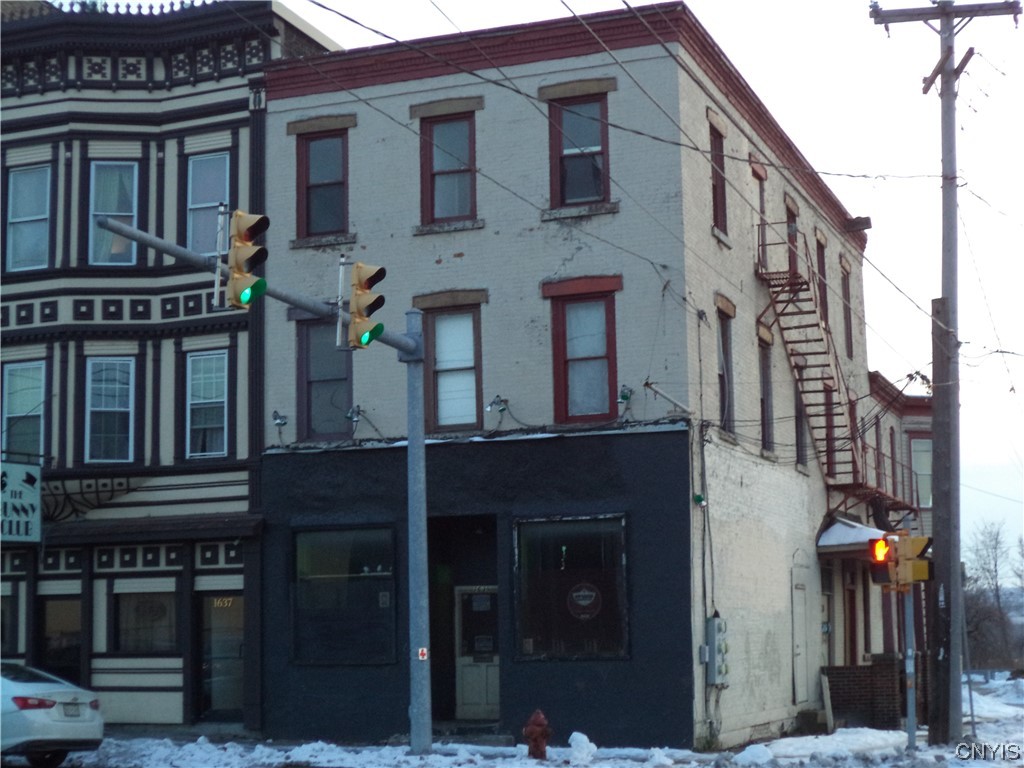 3 story commercial building in North side of Syracuse.  Has 4 apartment and 1 Store front. All Separate Utilite for apartments and store.  Building will need to be renovated. Estate Sale no repairs or C of C provide. Sold As-Is. Bring flashlight *** Not all apartments have power on****