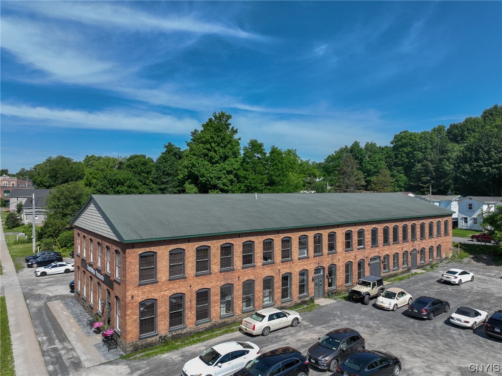 Introducing an exceptional commercial building in the heart of Pulaski, NY, offering a prime investment opportunity. This property boasts a triple net lease, ensuring a hassle-free and profitable venture. With a strategic location and an array of features, it presents an ideal space for diverse business needs.

Spanning 70% office space and 30% manufacturing space, this building caters to a variety of enterprises seeking a versatile working environment. The well-designed office areas provide ample room for administrative operations, while the manufacturing space allows for efficient production or assembly processes.

In addition to its commercial appeal, this property holds immense potential for a prime apartment complex development. Its strategic location offers convenience and accessibility, making it an enticing prospect for residential ventures. The property's existing infrastructure, including a sprinkler system and an elevator, further enhances its desirability and value.

Investing in this commercial building provides a unique opportunity to capitalize on Pulaski's business landscape and the growing demand for housing ahead of the Micron Project.