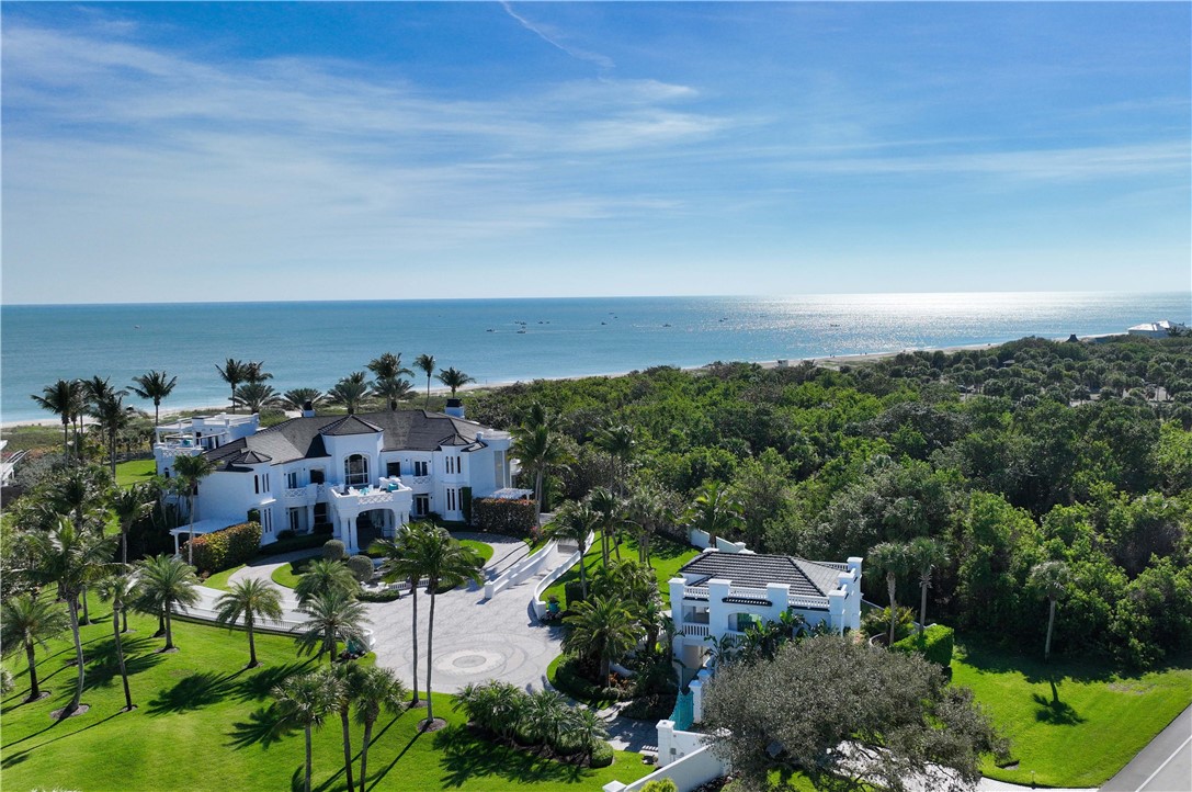 The only available ocean-to-river estate in Vero's Estate Section. Stunningly reimagined on 6± acres w/ 205' ocean frontage & 198' river front, the 23,000± SF home has 8 BR, 10 BA, media & game room, guesthouse, 10 car garage, & 400-ft dock w/ lift. The skydeck provides unparalleled views of sunrises over the ocean, sunsets over the river, a place to enjoy cocktails & relax in the spa.