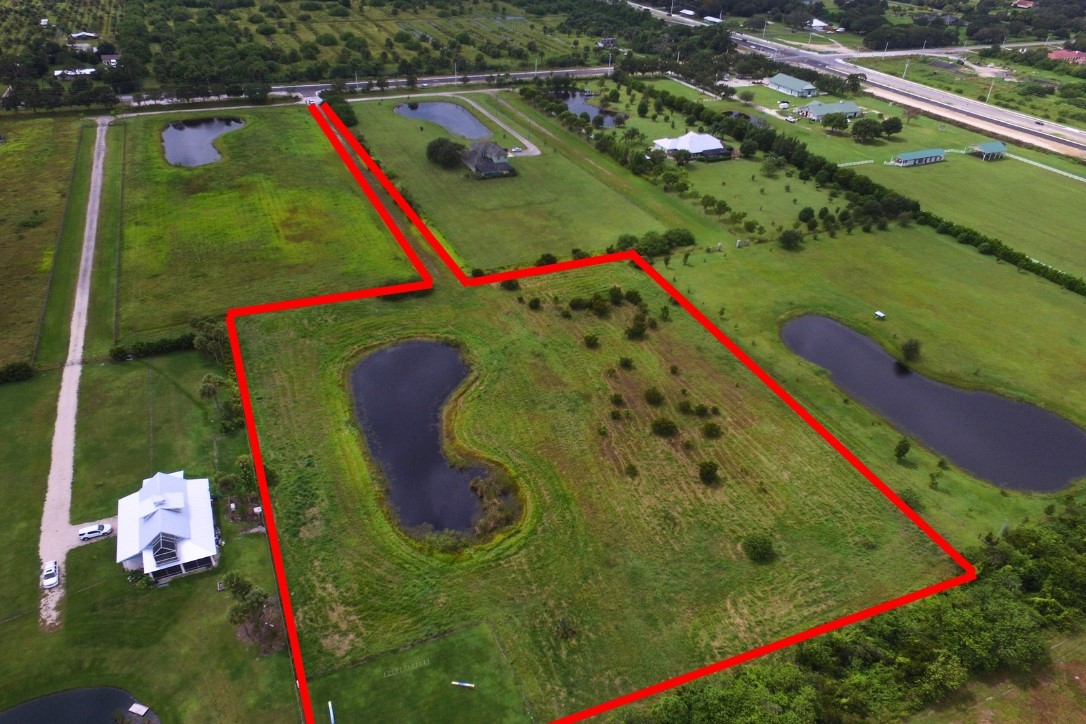 Great 5.38 acre property in a neighborhood of estate caliber homes in Winter Beach Equestrian Estates, yet close to town and on a paved road!  Its the best of both worlds - country living, yet just minutes away from beautiful beaches and major shopping.  Property is already cleared and a pond is in place.  Now ready for you to build your dream home!  Deed restricted BUT no HOA dues or expense! Bring your own builder.