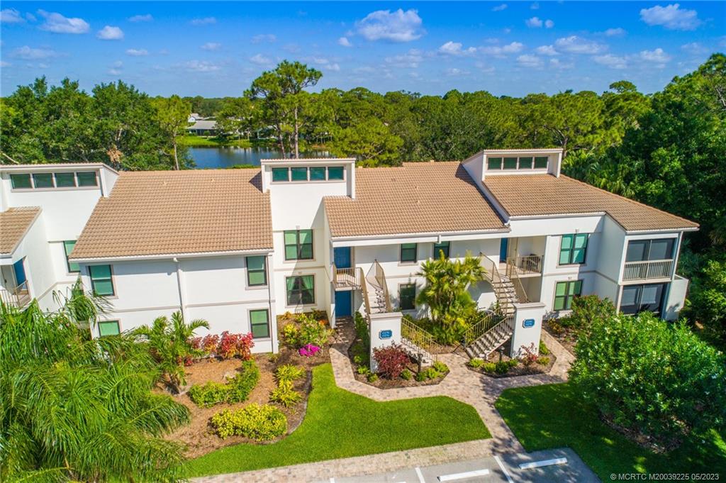 FURNISHED, UPDATED Kitchen and flooring, 2 bedroom, 2 bathroom, First floor, IMPACT WINDOWS, VIEWS of the 14th fairway of the Golden Marsh Golf Course from your screened-in covered patio. Wood style plank tile flooring in living area and carpets in bedrooms, Kitchen has Stainless Steel Appliances, White Cabinets, with island. Mile Lake Village has cart barn for golf cart, bicycle parking area by the village pool.  Harbour Ridge is a private, mandatory membership community featuring 2 beautiful 18-hole championship golf courses, 9 Har-Tru tennis courts, pickle-ball courts, impressive fitness facility w/ pool, sprawling waterfront clubhouse w/ 3 dining rooms, 2-mile riverfront walking path, biking, yacht club, and marina with boat slips available for additional fee. $125,000 Equity ($1,000 Refundable) due at closing. Monthly HOA Fee includes Club Dues, Trail Fees, POA, Village HOA, Capital Funds Fees & appropriate taxes.