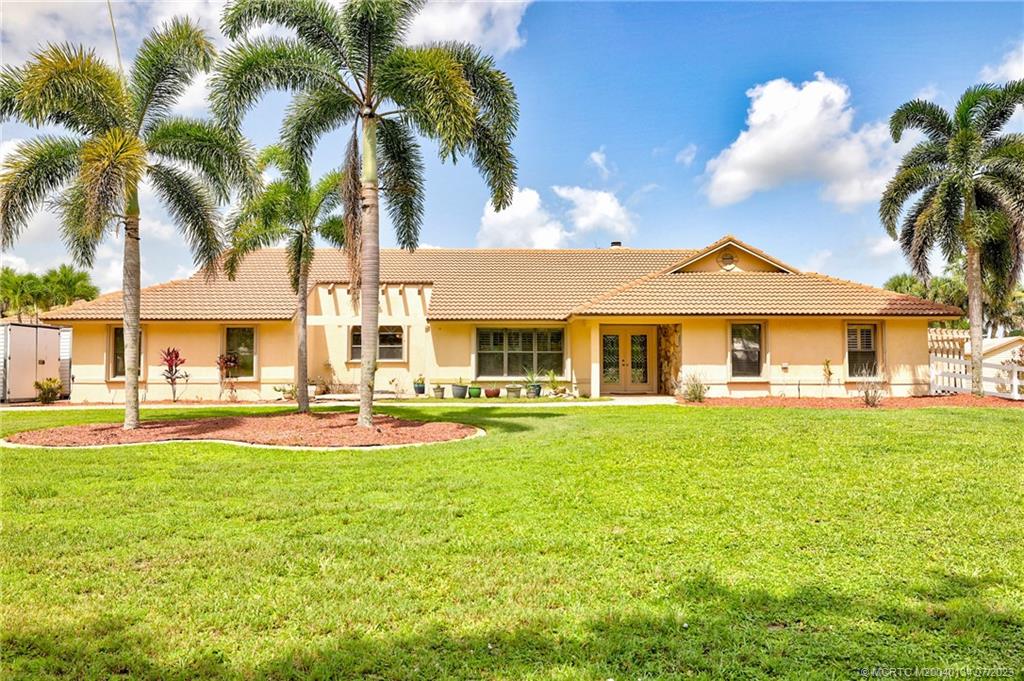 9813 Santa Monica Drive SW, Palm City, FL 34990