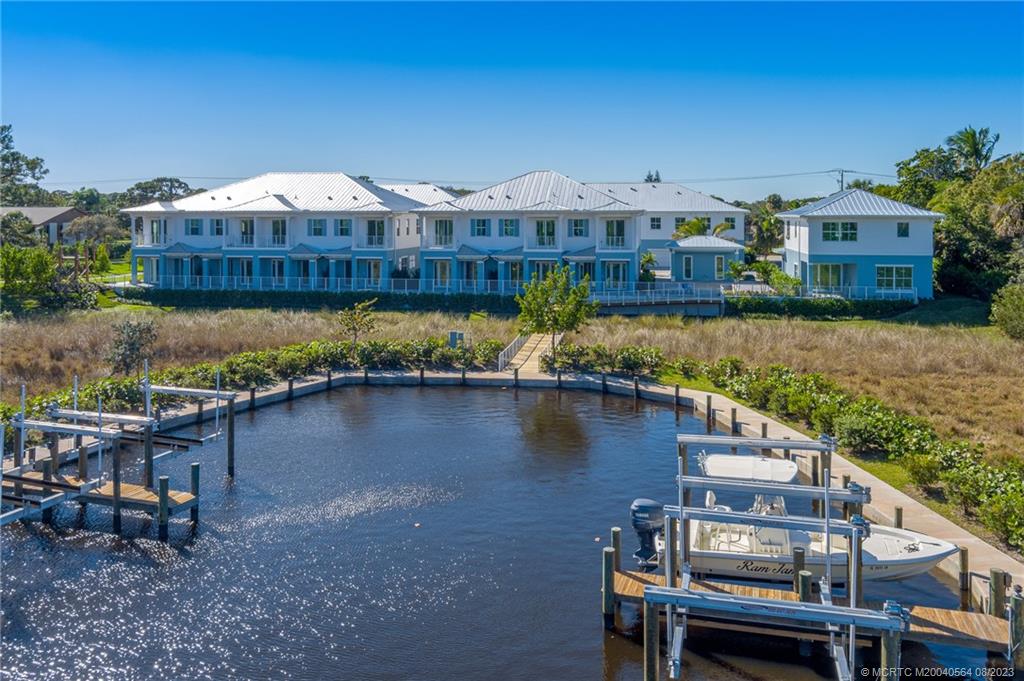BRAND NEW WATERFRONT TOWN-HOMES w/ DOCK/LIFT in STUART! Imagine a place where you can walk right outside your door, hop on your boat and be within minutes to world class fishing, WATERFRONT DINING, Sand Bar Fun, Paddle Boarding, Jet Ski, Kayak/Canoe, and all things water. This one of a kind location has it all. Being so close to the inlet, gorgeous BLUE WATER awaits you to unwind at the “STUART SANDBAR” after a day of boating. Tackle shops/Marinas/gas/Waterfront Dining are in the immediate area once you leave your dock. It doesn’t get any more convenient than this and you are truly located in the center of the BEST Boating lifestyle in South Florida…. The LUXURY units are HIGHLY UPGRADED and have "COASTAL" inspired finishes w/ 3 bedrooms, 2.5 Bath, and 2 car garages, dock w 10K lift. ONLY 17 total units! Solid CBS concrete block, Impact glass windows/doors, Custom Cabinets, Quartz Counter in Kitchen/baths, designer tile, frameless showers & more.