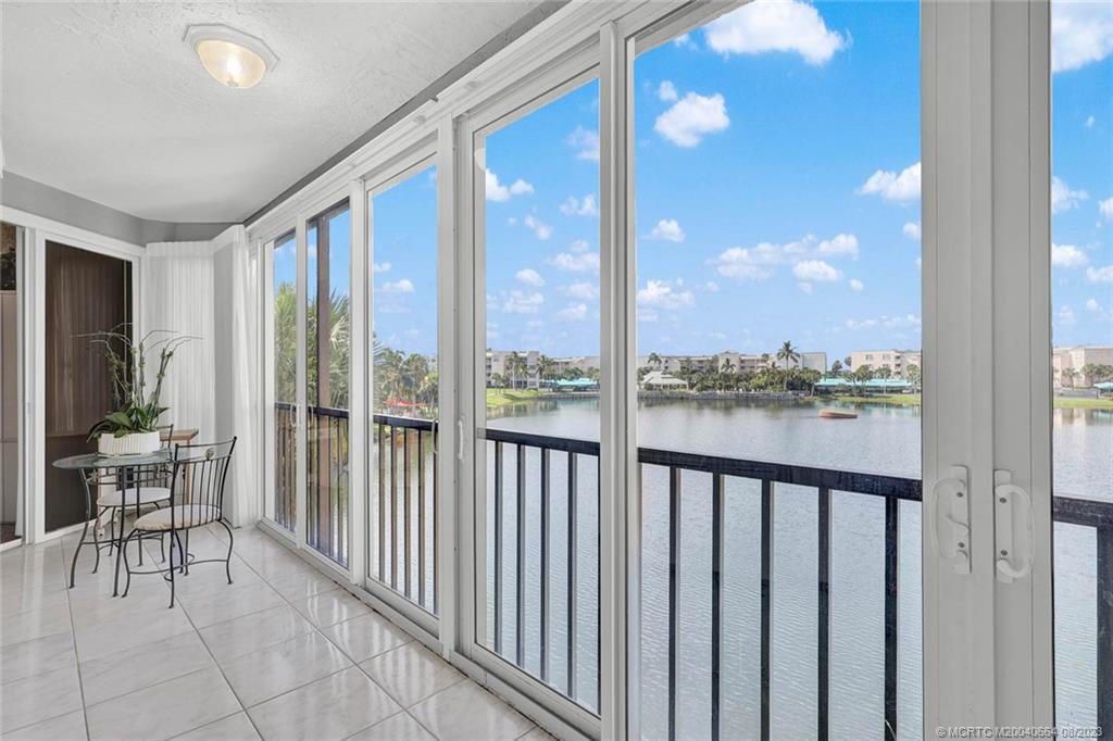 Don't miss this beautiful IRP lake front condo at Plantation Club Villas!  It's a must-see property in the heart of Indian River Plantation and is being sold furnished with a couple of exclusions.  This unit has covered parking, large storage spaces and impact glass.  Club Villas is adjacent to and a short walk to golf, tennis and more!  An Ocean Club Membership is available offering golf, tennis, pickle ball, fitness centers and beach club.  Great condo great location!