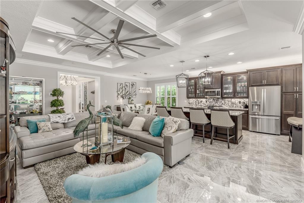 Experience the charm of Riverland, a highly desirable location in Florida recognized as one of the "Top Places to Retire" globally. An exclusive resort-style community for those aged 55+, this 4,000-acre master-planned community offers a vacation-inspired lifestyle you will surely fall in love with. Valencia Grove's Palazzo model is an exceptional 3BD/3BA with an extended 2-car garage custom-built by GL homes. Its sleek design, spacious rooms, and top-of-the-line custom upgrades will impress all who enter. Whether you seek a family home or a luxurious retreat, this top-notch property has everything. Every aspect of this meticulously crafted design has been carefully planned to ensure the best possible upgrades and provide ample natural light. Riverland offers world-class recreation centers, resort-style pools, racquet clubs, restaurants, arts and culture centers, spa and wellness experiences, walking trails, cultural events, & more. Close to beaches, public golf, and Cleveland Clinic.