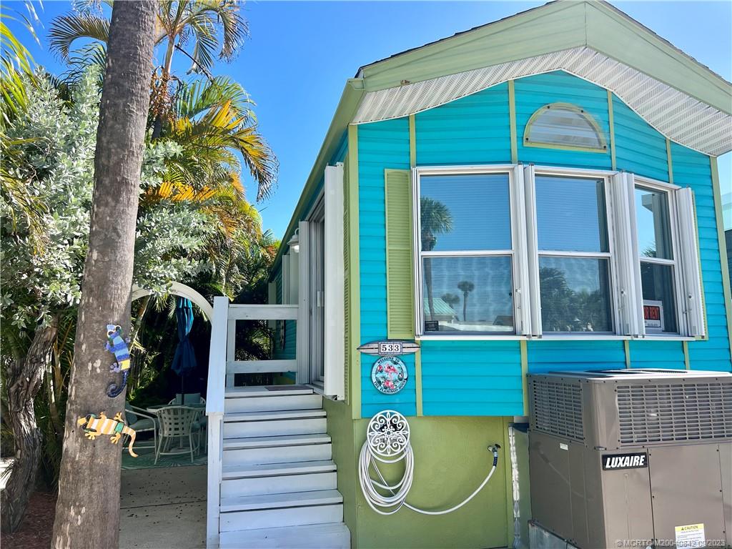 Looking for a perfect little beach house, here is your opportunity. Holiday Out #533 is an adorable 1/1 with new AC, Updated Pex Tubing, Accordion Shutters and a beautiful outdoor area nestled within lush, tropical landscaping, and new pavers, this outdoor oasis offers privacy and shaded tranquility. Inside you have new SS appliances and tons of natural light. This is an excellent investment if your looking to purchase on S. Hutchinson Island. Amenities include Private gated beach access, BBQ Grills located on our oceanside patio area, Oceanside Pool, Bocce, Shuffleboard, Horseshoes, Pickle Ball, Water, Sewer, Lawn Maint, Trash Pickup, Basic Cable all for $257/Monthly. This is a Treasure on the Treasure Coast.