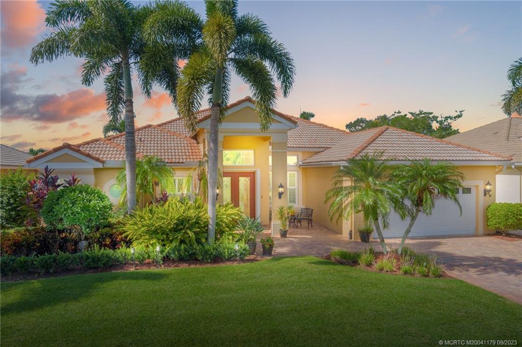 Welcome Home! This pool home offers 3 bedrooms, and office, 3 bathrooms and 2.5 car garage. Many upgrades and ready for new owner. Large 40x13 salt water pool, solar heated, updated main bathroom, updated guest bathrooms, large patio with retractable awning, plantation shutters, custom built in office, great golf and lake views are just some of the many offerings in this home. This Ballantrae Community offers a Jack Nicklaus Signature Golf Course with memberships available but not mandatory and a 67 slip marina on the St Lucie River with slips for sale or lease. Located close to beaches, restaurants, and shopping.