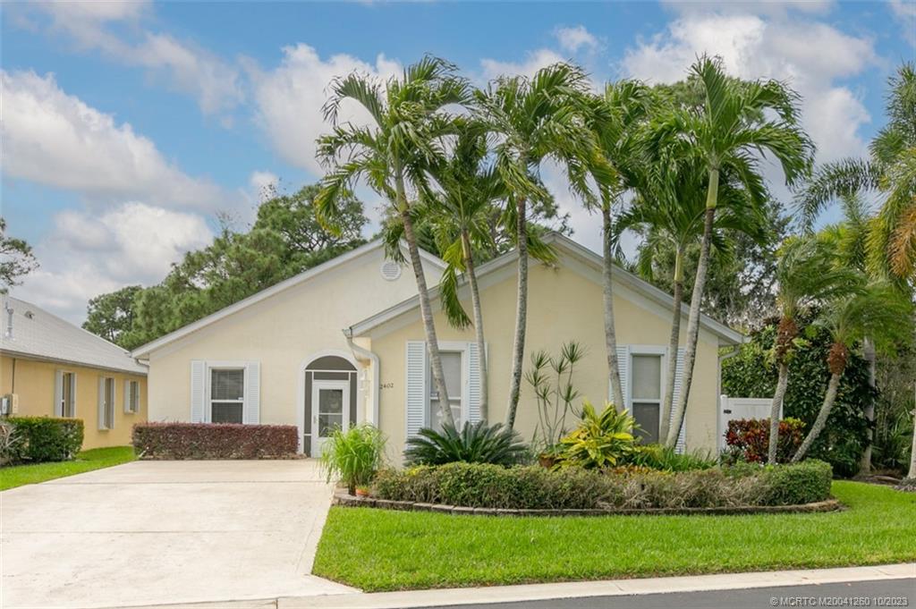 Welcome home to this picture-perfect home in the heart of Palm City.  This gorgeous home is nestled on a preserve in a quiet neighborhood yet located in the heart of everything. Walk to restaurants, parks and schools yet enjoy a quiet sanctuary backyard.  There is a gorgeous kitchen with huge island, stainless steel appliances, stunning granite and gas range and large pantry. Do you need an office? den? exercise room? dining room?  There are flex spaces that can accommodate you. Right inside the front entrance is a large room that can be used in a variety of ways!  Additionally, the home has a serene four seasons room right off the living room that can serve so many functions.  The primary suite has double sinks, two walk in closets and an oversized shower.  Dedicated laundry space has a ton of extra storage. Metal roof and hurricane shutters will give you peace of mind. And best of all "A rated" Palm City schools and close to I95 and the turnpike.