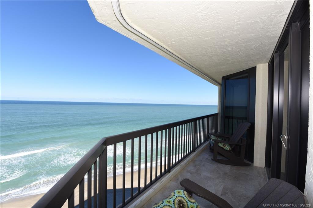 Renovated Oceanfront condo…Step inside and be greeted by a magnificent view that will take your breath away. The remodeled interior features a walk-in closet in the master bedroom, providing ample storage space for all your belongings.The kitchen is a chef's dream with Kraftmaid Cherry Cabinets, granite countertops, and top-of-the-line appliances, including an Electrolux Induction Range. Additional features include EGS Impact Doors & Window, a Bosch Tankless Hot Water Heater (2021) & a full-sized Electrolux Washer & Dryer. The Islandia I complex offers a range of amazing amenities, including 24-hour security, extra storage, on-site management, social and exercise rooms, sauna, two heated pools, hot tub, BBQ areas, car wash, tennis courts, pickleball, bocce ball court, and even boat and kayak storage. Please note that this complex has a 3-month minimum rental policy, allowing you to enjoy the flexibility of renting it out twice a year. Unfortunately, pets are not allowed.