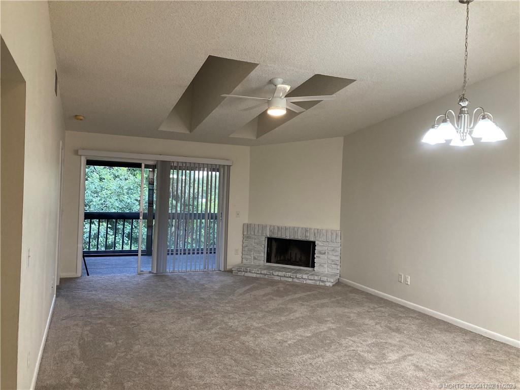 . Vaulted ceilings with sky lights, fireplace and newer carpet.  Washer dryer inside.  Well kept and ready for you..  Well kept and ready for you.  Close to downtown hobe sound, shops, and beaches.  Storage area for boats and rvs as available.