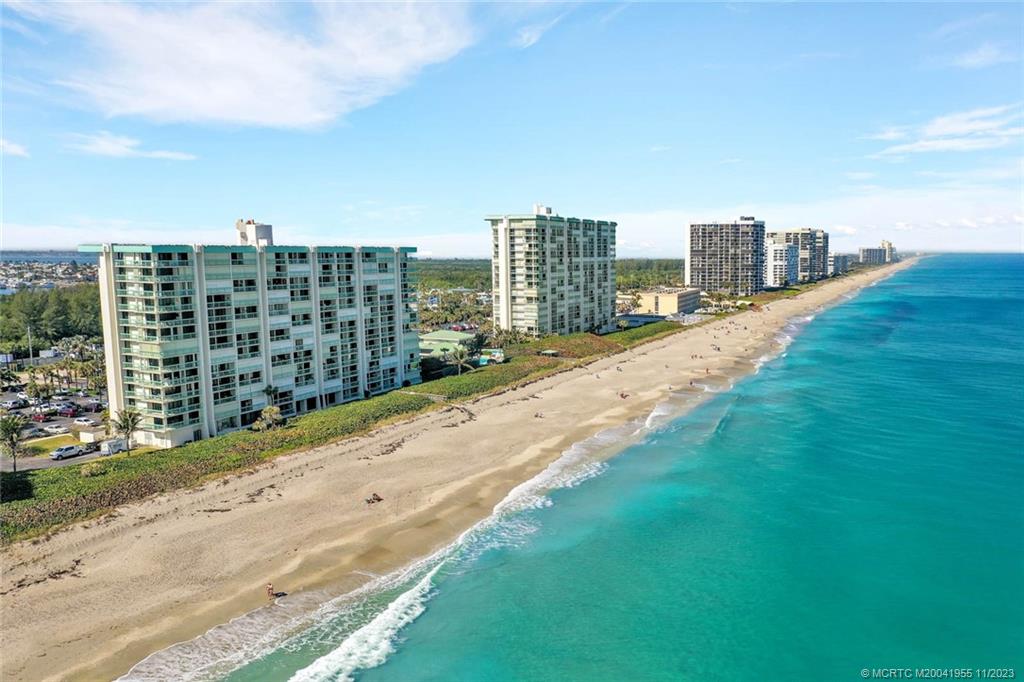 Beach Front! Completely renovated in DECEMBER 2019. Full Ocean and Intracoastal views from this 12th floor 2BR, 2 bath. PENTHOUSE CONDO. This condo has it all !!! NEW IMPACT SLIDERS 2023,textured ceilings, 24 inch porcelain tile throughout, white raised panel cabinets in kitchen with soft touch close, Quartzite counters, glass tile backsplash, stainless steel appliances, bathrooms with Cambria countertops, new hot water heater and HVAC 2019, new hurricane shutters 2019, walk-in closets and FULLY FURNISHED . Community amenities include a clubhouse, social room, heated pool, tennis, shuffleboard, RV/Boat Parking, billiards and a dune walk to the beach. -1 pet under 20lbs and 3 month minimum rentals allowed.