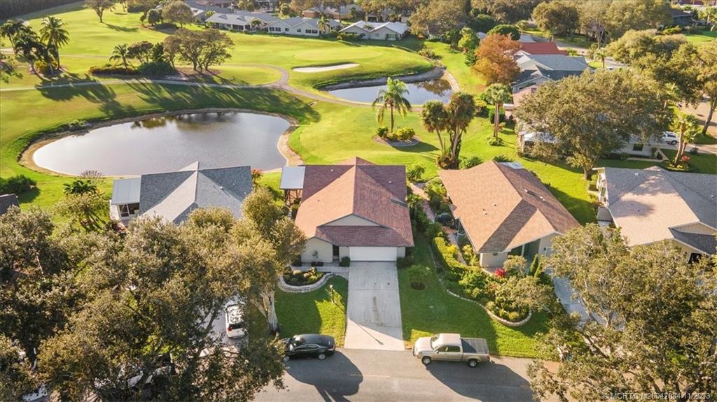 Nestled in the beautiful community of Eaglewood, this 3 bedroom, 2 bath, completely remodeled home sits directly on the golf course. The gorgeous golf and pond views provide built in relaxation in your own home! Access to Jupiter, Beaches, the Intercoastal, and I-95 are only a short drive away. A community pool, and clubhouse, as well as unlimited golf are all included in the HOA. There is even space in the garage for your personal golf cart! Updates include a brand-new kitchen with beautiful quartz countertops, solid wood cabinetry, bathrooms,  fresh paint, and wood-look vinyl plank flooring throughout. In addition, the Entry door, garage door, exterior paint and roof coating on Lanai all relatively new. Unlimited Golf and Tennis for homeowners. Check out this must-see property in Martin County's Hobe Sound.