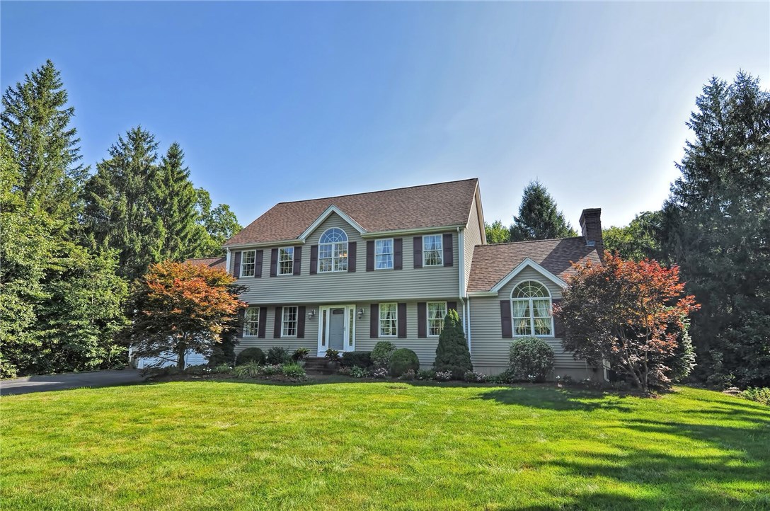 A Stunning Custom Built 3 Bedroom Colonial In A Highly Sought After Neighborhood On A Lush Private Corner Lot With Meticulously Maintained Grounds. Upon Entering Through The Grand 2-Story Foyer You Will Find An Open Floor Plan, Perfect For Entertaining, Gleaming Hardwoods Throughout, A Custom Kitchen With Granite Countertops And Newer, High End SS Appliances Which Abuts The Breakfast Nook That Leads To The Back Deck; A Dining Room & Formal Living Room W/ French Doors & Beautiful Moldings, and A Large 1st Floor Laundry Room. The Sun Drenched Family Room Showcasing A Fireplace W/ A Custom Floor To Ceiling Mantle, And Cathedral Ceilings. Upstairs You Will Find A Large Master En-Suite W/ Cathedral Ceilings, A Large Walk In Closet & Master Bath; As Well As 2 Additional Bedrooms And  Full Bathroom. Some Upgrades/Features Include: New Roof and Siding, Irrigation, Surround Sound, C/A, Water Filtration System,Custom Windows, Invisible Fence & So Much More! Attention To Detail Throughout. Prime Location!