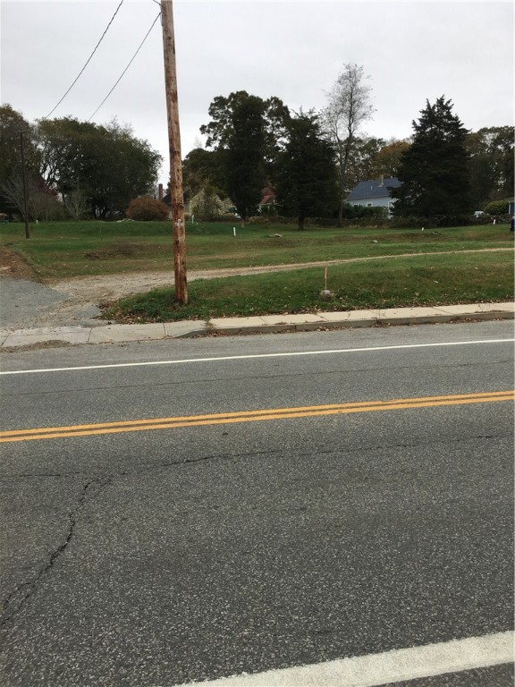 High Visibility lot on Main Rd in Tiverton.  May be used as residential, condo, or multi-family.  Boundary survey, engineering study, perc test, septic deign, soil survey, water table verification in hand.