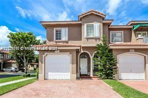 You simply cannot miss this opportunity! This is the perfect 3 BR/2.5 BA corner town home for you in the heart of Kendall.  This beautiful home offers tile on the first floor with separate living, family & dining room. The upgraded kitchen w/ SS appliances & double ovens will inspire your inner chef. Bonus room that can be used as an extra bedroom, den or office.  The 2nd floor offers wood floors, laundry,  spacious master suite w/ Roman tub & separate shower.  Ceiling fans in all bedrooms. Also includes accordian shutters & large fenced in patio great for entertaining. Located in quiet community w/ pool. within walking distance to shopping & restaurants.  Will not last! OPEN HOUSE SAT, NOV 27 from 12-4.