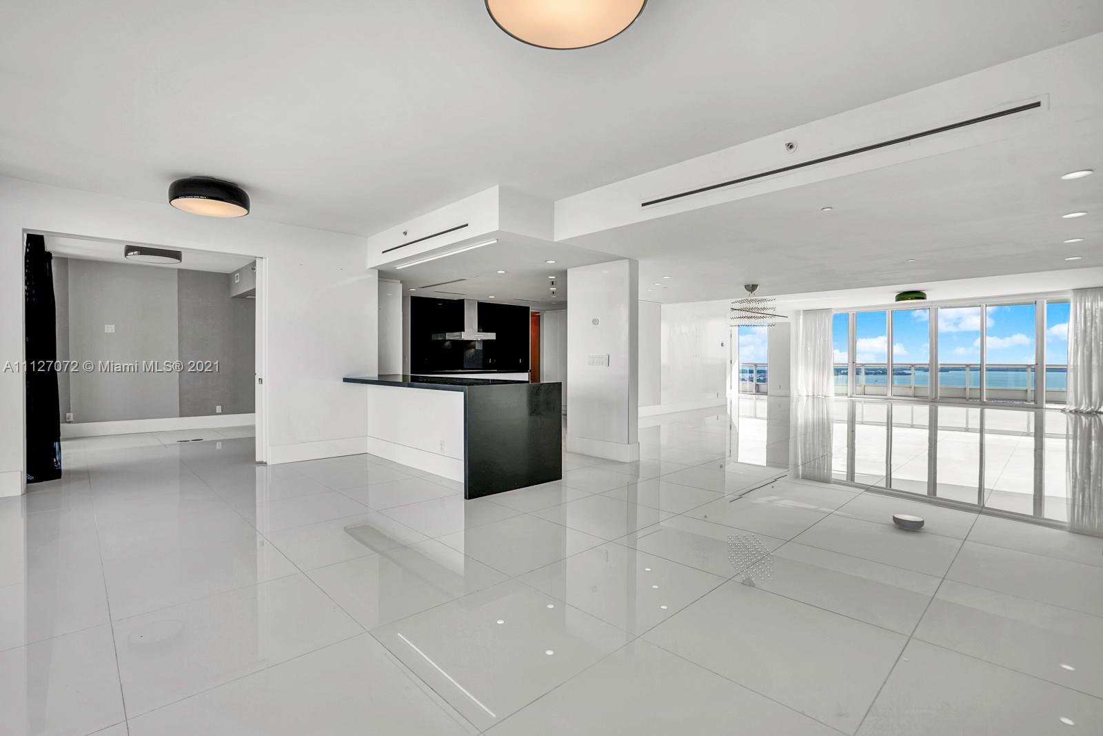 This Majestic 4,030 sqft unit at Santa Maria features floor to ceiling windows with spectacular PANORAMIC VIEWS from Downtown Skyline, Key Biscayne and the Atlantic Ocean. This unit was designed by the renowned interior dedigners Angel Sanchez & Chris Coleman and modern style 4 Bedrooms, 4.1 Bathrooms plus office space designed for family enjoyment. This unit features large master suite with sitting area and balcony, private foyer, spacious living and dining area. Enjoy luxury amenities as part of living in Santa Maria such as waterfront pool, marina, business center, tennis courts, club house, private gym in the 51th floor, and café restaurant in lobby.