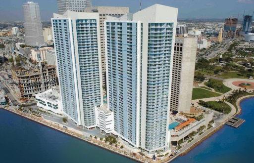 One Miami Condo consists of two buildings, east and west, and is located on the most desired Waterfront Corner in  Downtown Miami, at the gateway of where Downtown meets the Miami River and Biscayne Bay. This spectacular LOWER PENTHOUSE have 3 beds, 2 baths, 1,416 SF. If you choose to explore and live at one Miami you can expecting designed kitchen cabinetry with modern stainless steel double sinks elegant granite granite countertops  and elegant bathroom fixtures. One Miami offers a number of spectacular amenities for its residence such as 24 hour security and concierge 20 lap and resort style pools hot tub state of the art fitness center business center lush tropical Landscaping and club room. One of the best units in the building and certainly the best deal to rent now.