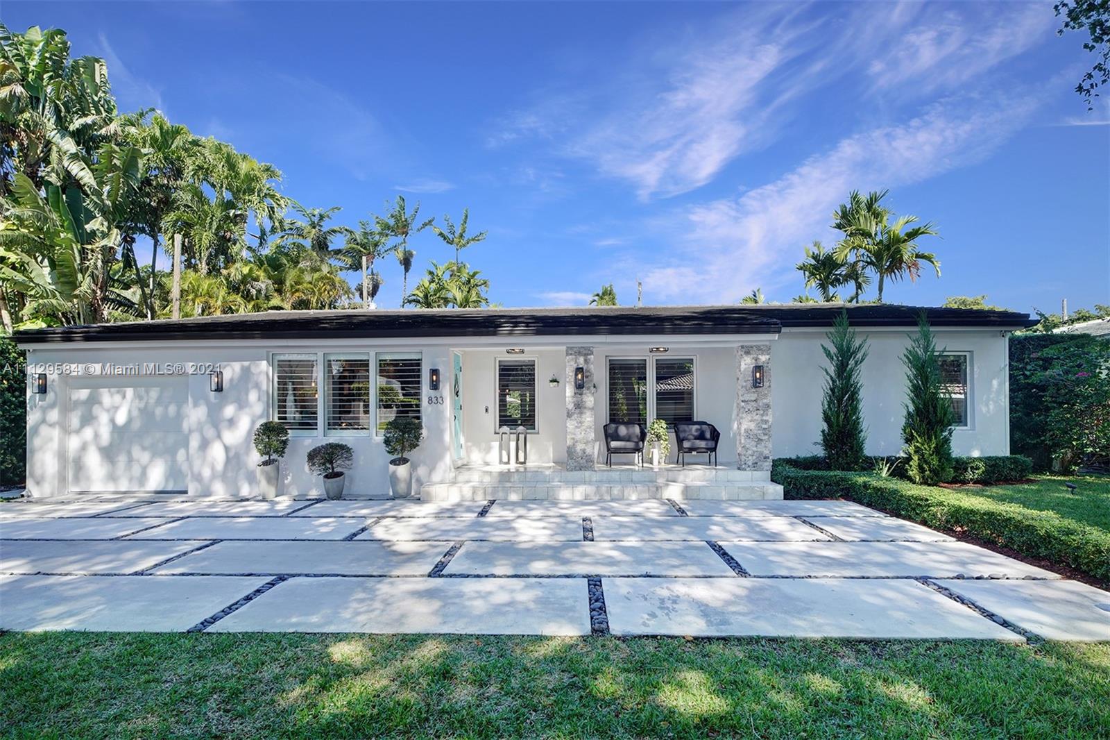 Marvelous Coral Gables house, completely remodeled and updated (2017) with modern and top of the line materials, all windows are impact glass, located in one of the best areas of the Gables just minutes away from Miracle Mile, University of Miami, Biltmore Hotel and the Golf course! 4 bedrooms and 3 full baths plus office space, large living area, stunning kitchen with Italian cabinetry, large eat-in countertop and European appliances. Amazing fixtures around the house including Italian doors, beautiful freestanding tub and much more! Very spacious patio with covered area and room for pool, great for parties and get togethers. In addition, the house has a Tesla charging station and outdoor security system. You will definitely fall in love with this wonderful house!