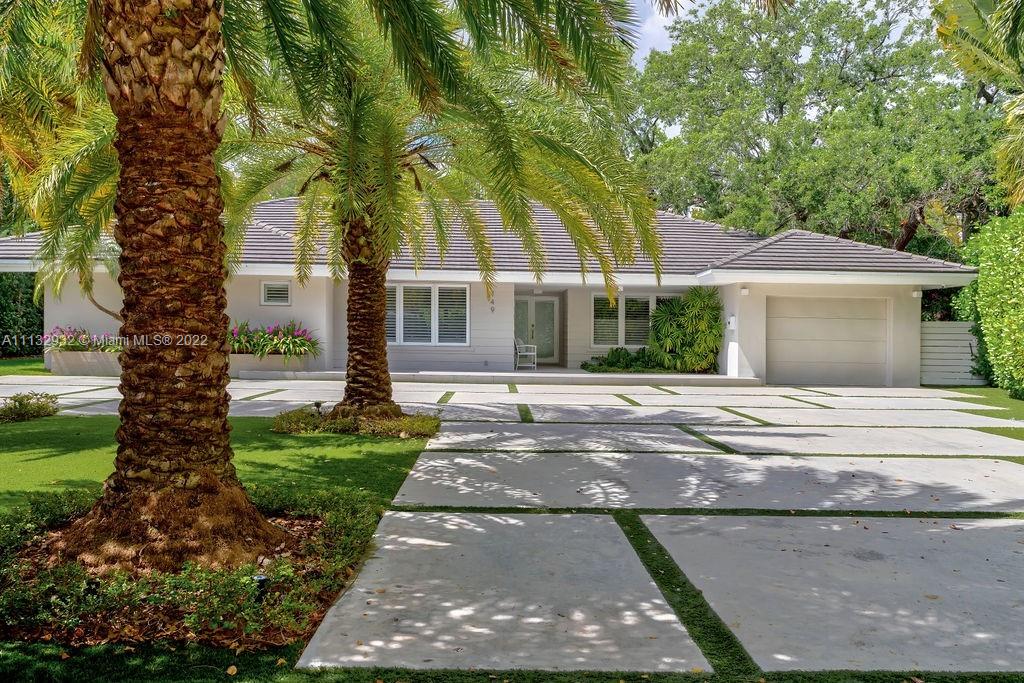 Spectacular Corner House for sale: Oversize 19,183 sqf lot, 4 bedrooms with custom made closets, remote control blackouts, Bahamian shutters, each bedroom has its own full bathroom.  Guarded community of Bay Heights.