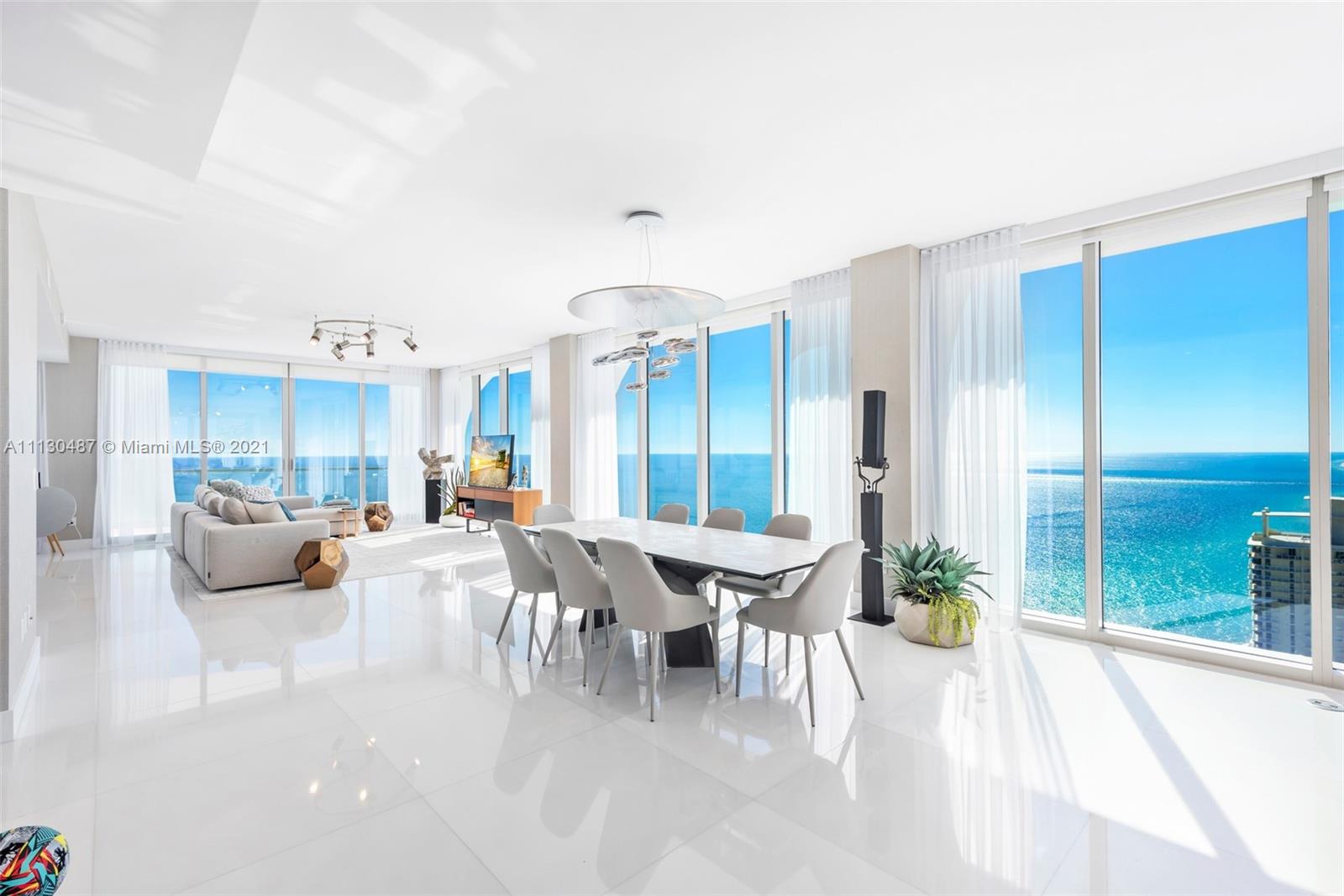 This spectacular mansion in the sky has unobstructed 180’ views of the ocean and the city. With 5 beds, 6.5 bath, 4,361 SF, this corner unit has the ideal floorplan. Featuring an expansive oceanfront master suite, bathroom and walk-in closet. 3 additional bedrooms with en-suite bathrooms as well as a service quarters and laundry room. Additional storage unit and 3 assigned parking spaces included. Take advantage of the resort like amenities including the famous Tata Harper spa, beach-side heated pool, private beach pavilion with beach services, resident restaurant, bar and separate breakfast, gym, library, billiard room, child play area, teen room, valet and more. The unit is now vacant, easy to show!!!
