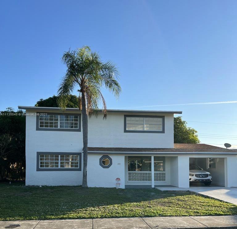 Beautiful two story 5/2 remodeled with an open floors plan concept. Spacious with lots of natural light. Centrally located in the East side of Pompano Beach. Home features brand new A/C, Custom kitchen, updated floors throughout, backyard with fruit trees. It has room for pool and entertainment!
