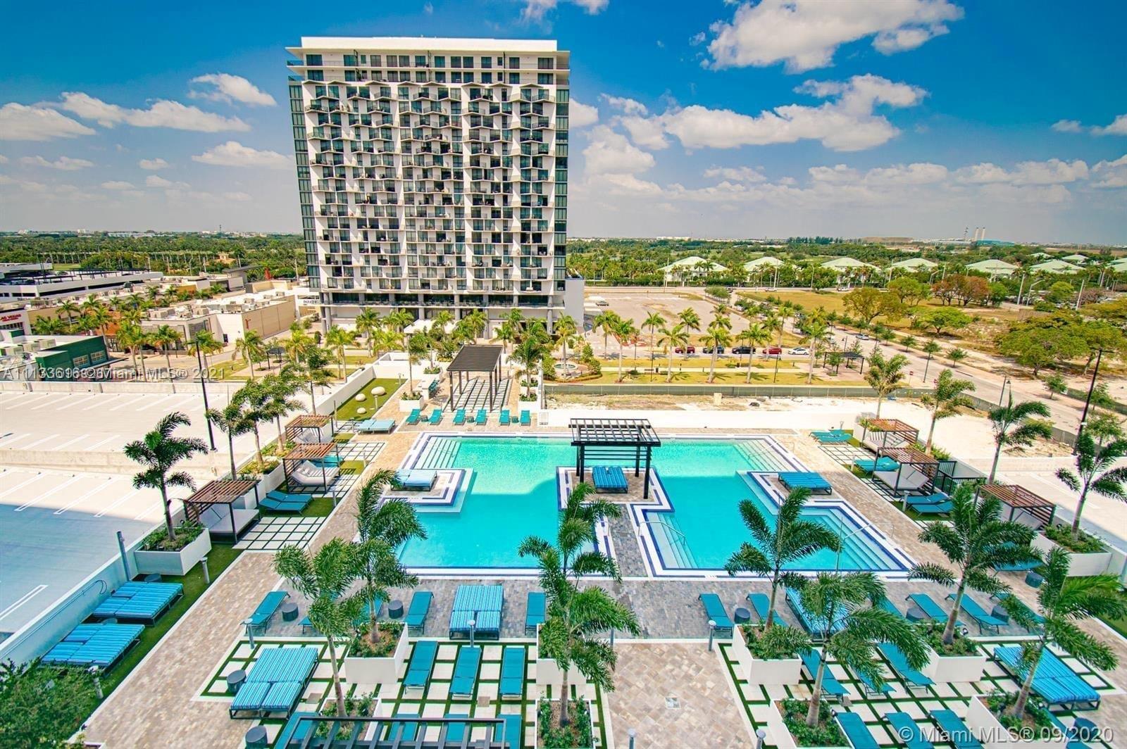 Opulent Living + Return On Investment have an address: 5350 Doral. Looking to escape w/out traveling? Imagine the views of tree lined Downtown Doral w/ shops & restaurants w/ outdoor sitting areas, all while sipping cocktails in an oversized L-Shaped balcony. Imagine no more. To Live or Rent? Choose both, separated into two units w/2 keys. Only building in Doral to allow Airbnb. Styled & furnished down to the silverware and towels curated by renowned interior designer Adriana Hoyos. Floor to ceiling windows assure a bright feel for watching days turn to nights. Stylish common areas, combine the beauty of nature w/ the comforts of inside spaces bringing them to new heights, 24-hr valet, sauna, fitness center, electric car charging stations, Pool, etc