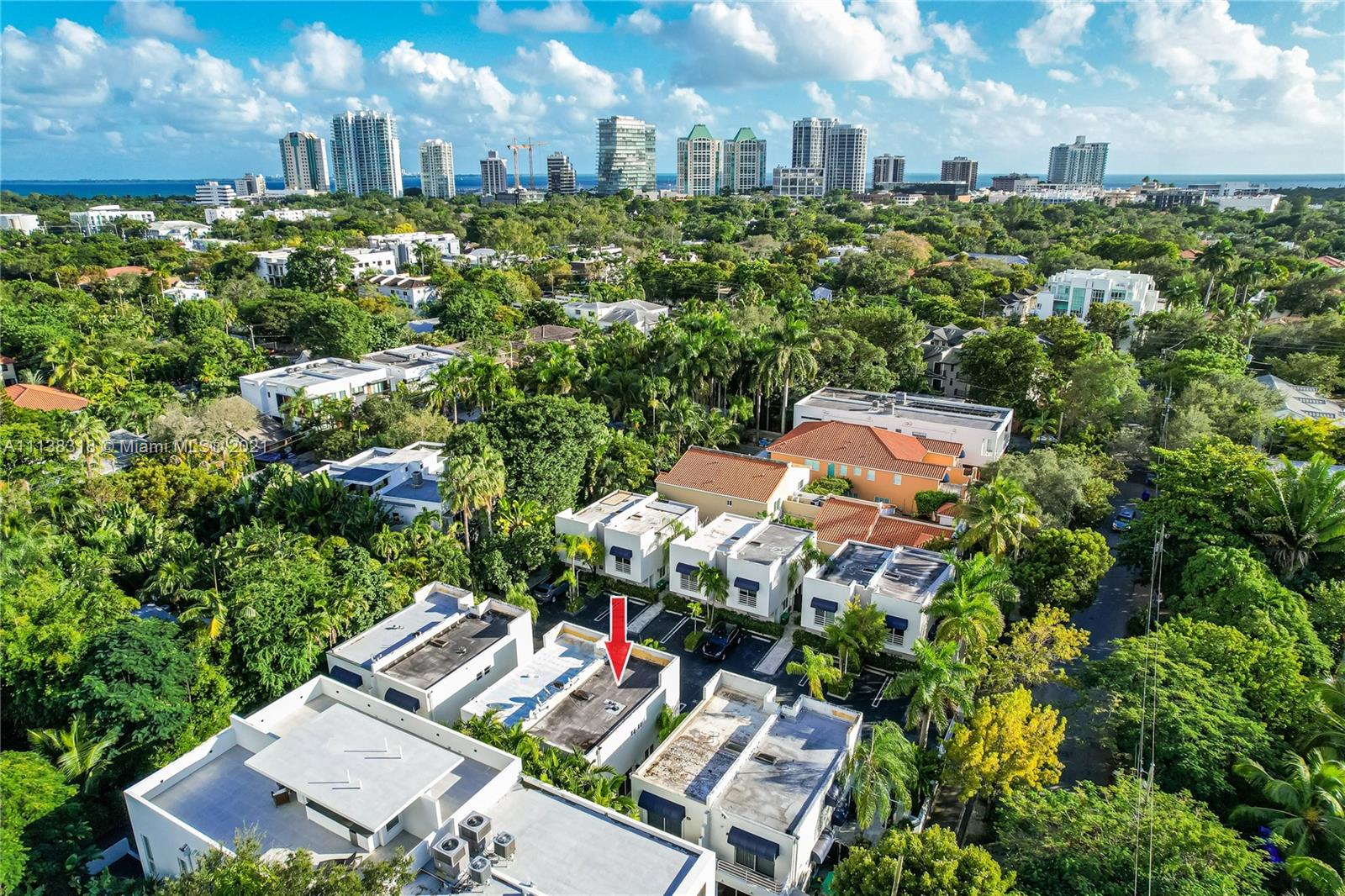 NEW LISTING IN COCONUT GROVE!!! 2BD/2.5BA split plan 2 stories townhome in a secure gated complex. Rarely on the market… alfresco secluded tropical setting in the heart of Coconut Grove. 2 outdoor terraces, 2 assigned parking spaces, lots of natural light also included 2nd floor skylight ceiling fixture, new flooring in the first floor, remodeled bathrooms and kitchen.  Only 12 units in the complex with a private community swimming pool and very large green area. A must see!!! Exclusively represented by Angielle Knowle, easy to show….