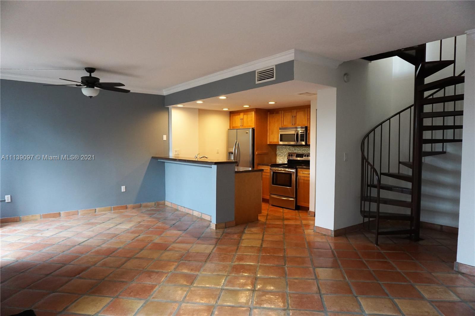 Super nice and perfectly maintained 2 bedroom condo in great a Coconut Grove location.  Each room has full length sliding doors giving it a very open and bright feel.  There is a huge, beautifully decorated patio.  You'll love the well laid out, recently redone kitchen with wood cabinets, granite countertops and stainless appliances.  This home is truly move in ready.  You will be walking distance to all the great spots in the Grove and about a block from US-1.  Your next to public transportation and close to the Gables, Brickell and Coconut Grove.  The community is gated and there is a pool next to your unit.