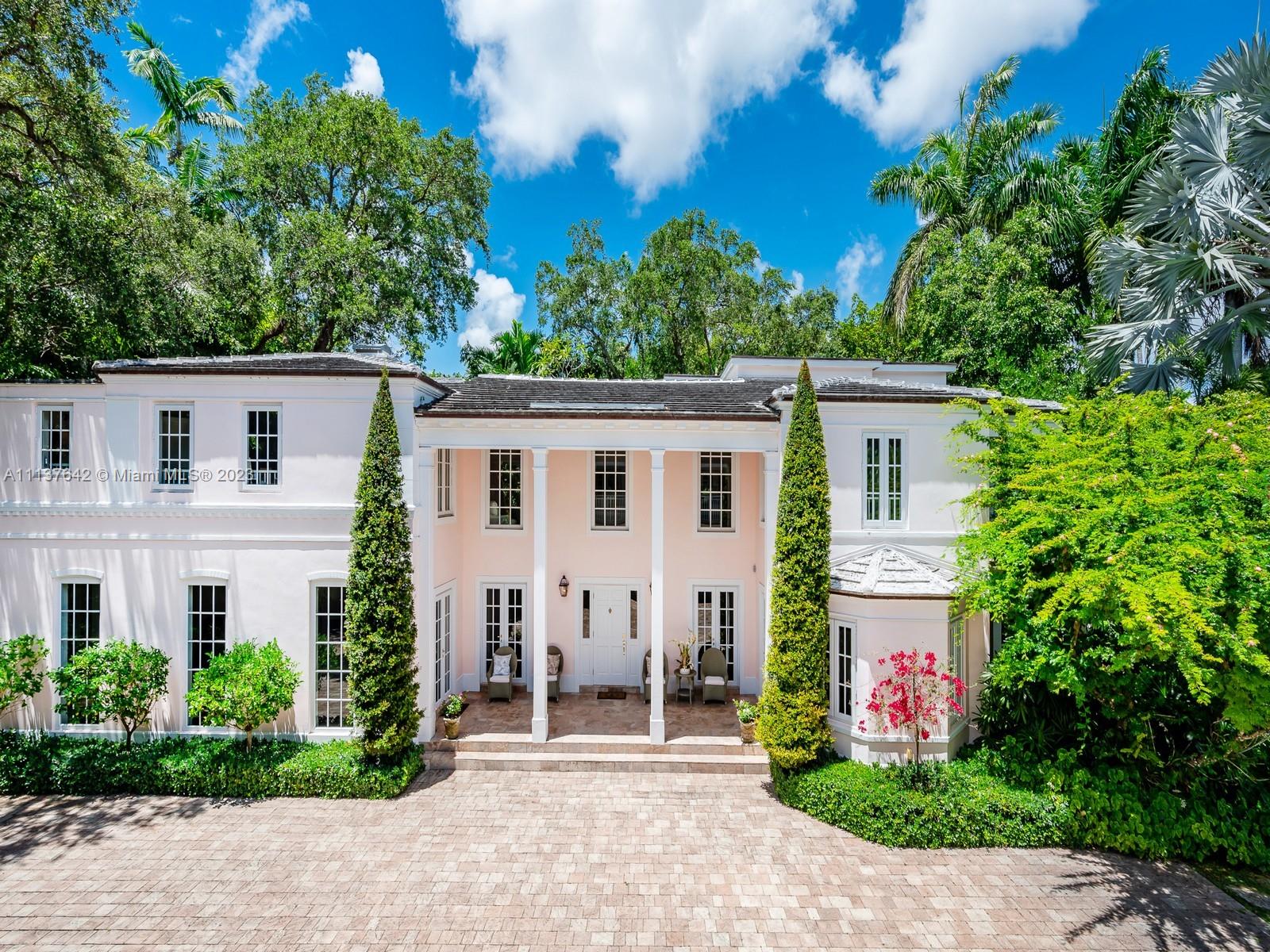 Unparalleled charm & sophistication hallmark this one-of-a-kind private compound offering 3 individual structures nestled in Coconut Groves most exclusive private, waterfront & guard-gated community,The Moorings. Main House boasts 7500SqFt.5BR/5BA, originally built in 1934 & reinvented in 2008. 1st floor features a grand foyer, formal living & dining rooms lined w/French doors, spectacular, stainless steel kitchen surrounded by open living spaces, perfect for entertaining. Graceful staircase leads to family area, 3 oversized en-suite bedrooms & primary suite w/sitting area, private terrace, spa like bath & 3 walk-in closets. 5000SqFt Cabana House w/pool, boasts sweeping staircase, double height ceilings, kitchen, guest suite & balcony. Charming 1BR/1BA Guest House sits atop a 4 car garage.