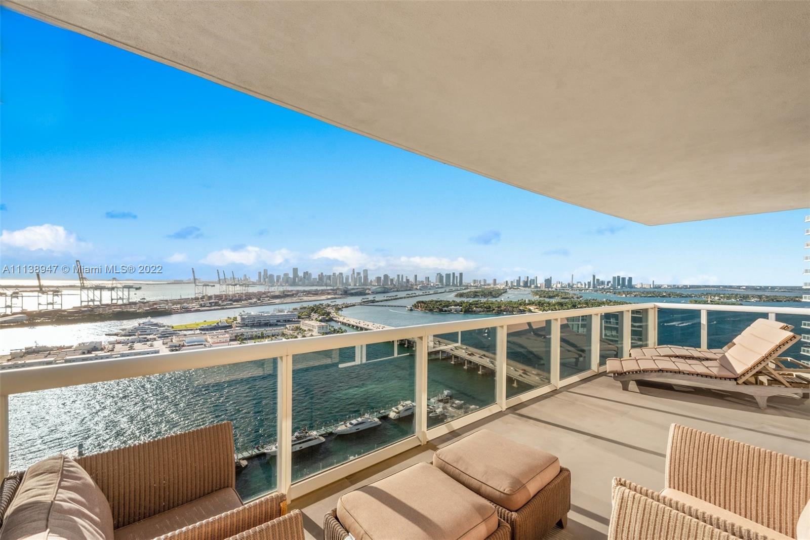 Magnificent flow-through residence with unobstructed views of the Downtown Miami skyline, Biscayne Bay & the Ocean.  Professionally designed by award winning Jeffrey Thrasher, with a beautiful oversized pivoting door that greets you from your own private elevator lobby. Featuring three terraces, custom open floorplan, media room, white porcelain floors, electric shades,
updated kitchen, custom cabinetry and designer finishes throughout.  150 cm x 150 cm "Havana" limestone floors.  All doors and hardware are custom made, with all bathrooms completely re-designed.   Murano Grande is a South of Fifth Neighborhood luxury building with recently restored & updated pool deck + on-site restaurant, tennis, gym, 24 hour security, valet and concierge.