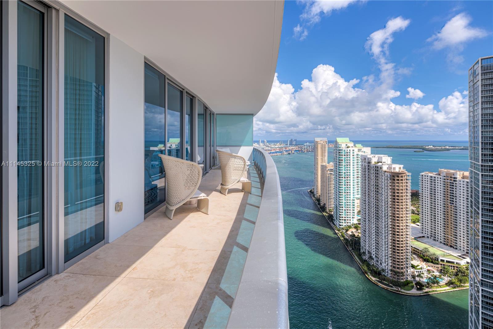 The epitome of luxury in this Epic Residence featuring the finest finishes. 3 bedroom 3 1/2 bath. The breathtaking & unobstructed views over Biscayne Bay, Brickell & Key Biscayne are stunning. This corner unit with 10ft ceilings with floor to floor ceiling windows creates an inside/outside environment where everyday the light brings a new feel to this space. Limestone floors, built in Millwork entertainment cabinet, solar shades, upgraded appliances all are details beyond expectations.  Epic has great amenities such as private pool for residences and many other shared concierge-style elements shared with The Epic Hotel. Home to world class dining with Zuma and Area 31. 2 parking spaces. and a private storage locker. Epic is your dream space you've been waiting for. Easy to show.