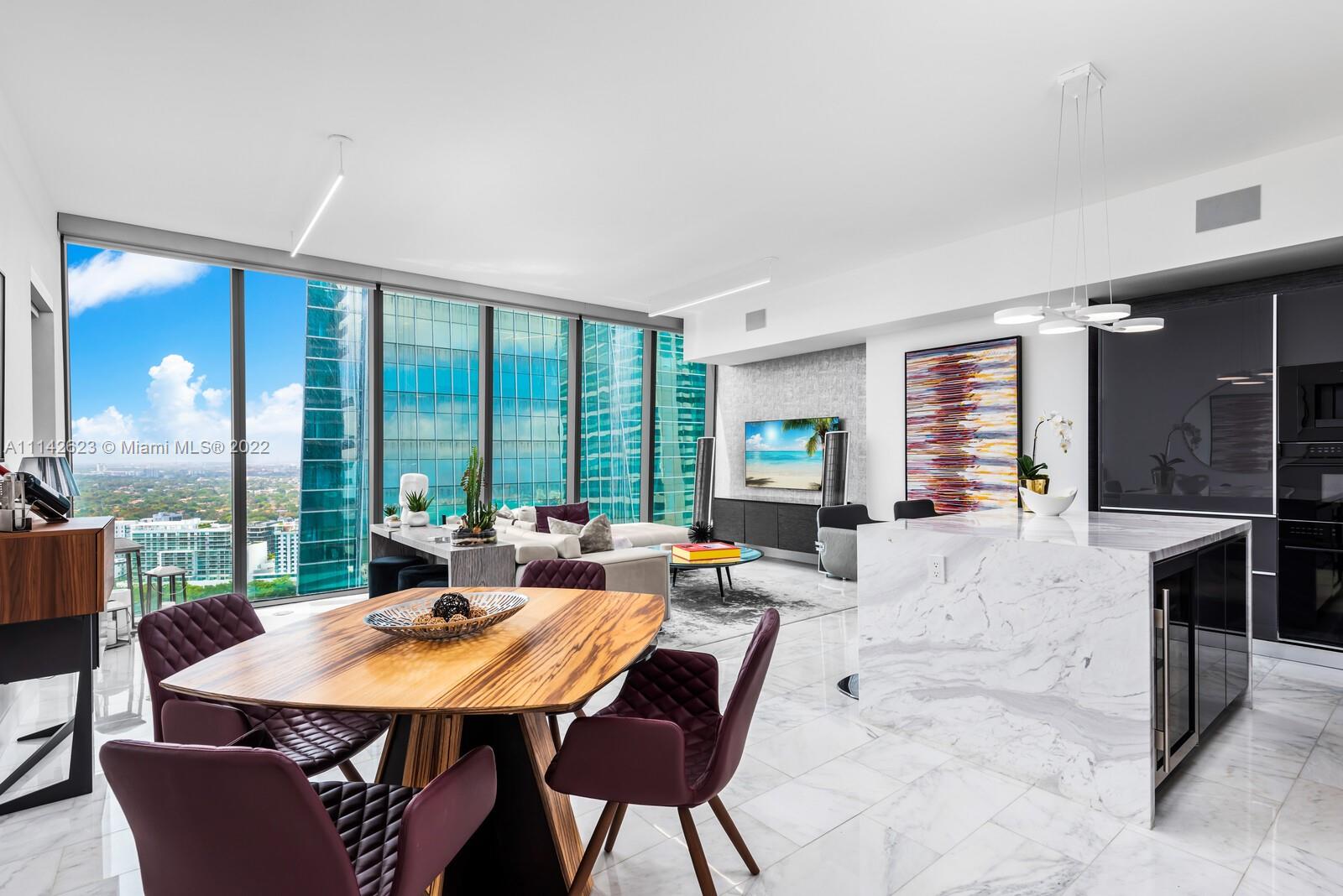 One-of-a-kind Carlos Ott-designed unit in ECHO Brickell spans 1,455sqft and showcases flawless luxury throughout. Expansive floor-to-ceiling windows frame city and water vistas while drawing natural light into the open-concept living space. Marble floors flow underfoot and the gourmet kitchen boasts high-end Wolf and Sub-Zero appliances, an island and sleek Italian cabinetry. Smart-home enabled with surround sound speakers along with one tanning balcony and second terrace with outdoor barbeque. Custom layout with 2 bedrooms and 2.5 baths including the primary bedroom with deep walk-in closet. Extra features include full size washer and dryer in unit and a host of building amenities including gym, spa, 24-hour valet, house car and multiple pools with spectacular bay and city views.