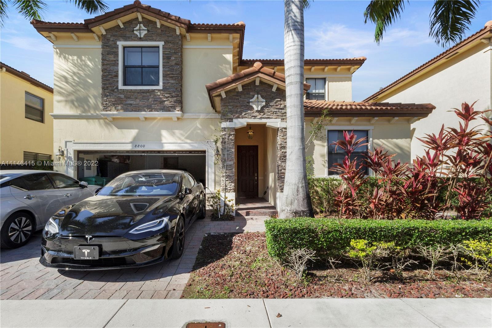The Isles at Grand Bay / Doral / 5 Beds / 4.5 Baths / 3,820 sq. ft. of living area / Beautiful lakefront single-family house with pool / Open kitchen with granite countertops, breakfast area, and stainless steel appliances / Guest House (In-Law Suite) with 1 bed, 1 bath, and a mini kitchen. It is an ideal home for an extended family! / 2 cars covered parking garage + 2 driveway parking spaces / Enjoy the impressive and convenient amenities of Doral Breeze community including a clubhouse, water park, tennis court, pools, gym, basketball court, and more much more!