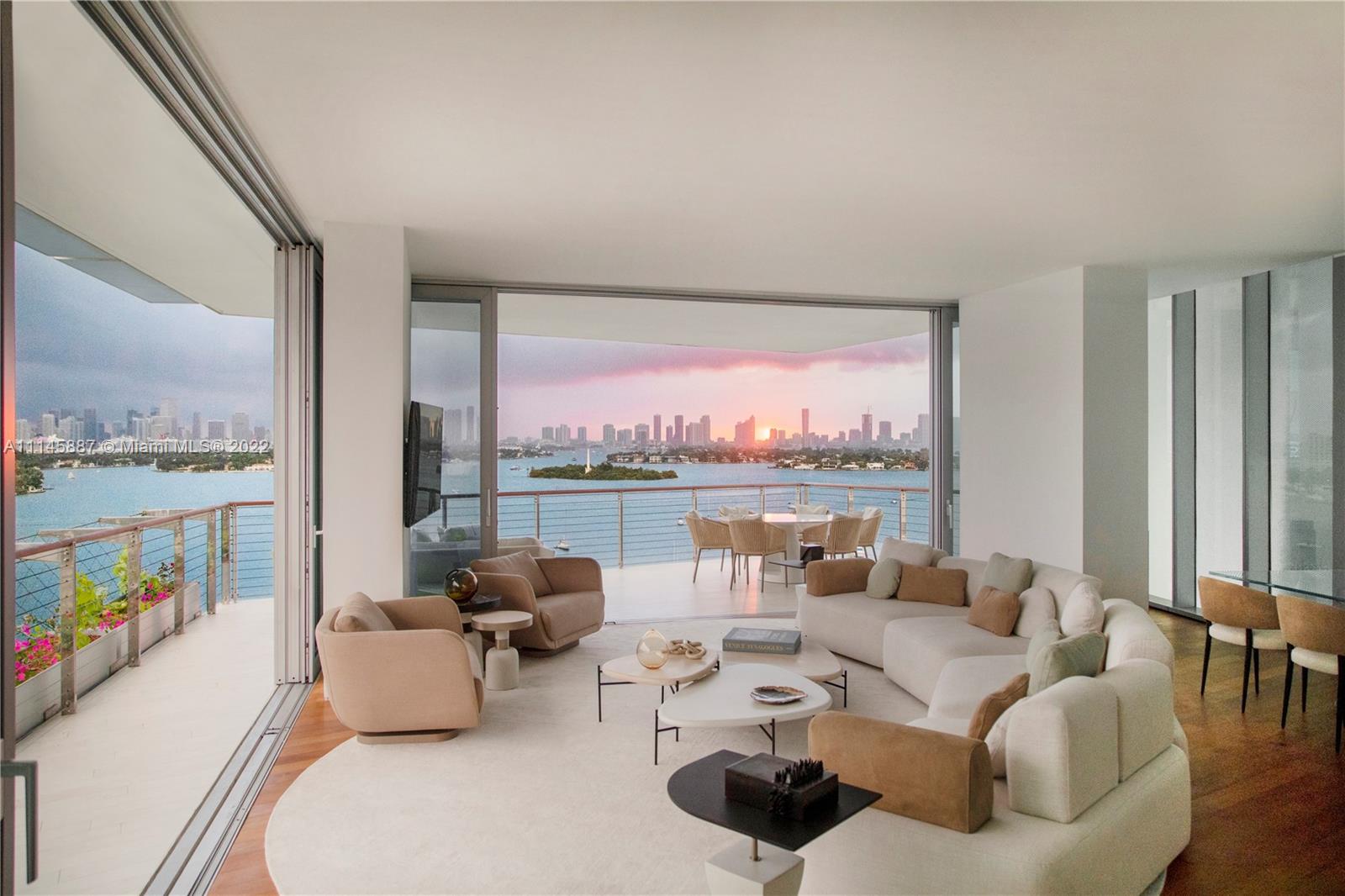 New & Never Occupied, 3/3.5 Residence with 180 views of Biscayne Bay and the Miami Skyline.  Monad Terrace is an exquisitely designed 59-unit condominium by Pritzker Winner, Jean Nouvel, featuring stunning architecture with brilliant light, private outdoor space, climbing gardens, unique sawtooth honeycomb facades & stunning sunset views of Biscayne Bay. Kitchen with dramatic sculptural marble island in Calacatta. Master baths with richly veined, spacious stone countertops, marquetry flooring and tiled walls. Other notable features include custom cabinetry & built-in features, designer fixtures, teak flooring throughout & private elevators. Immediate Occupancy.