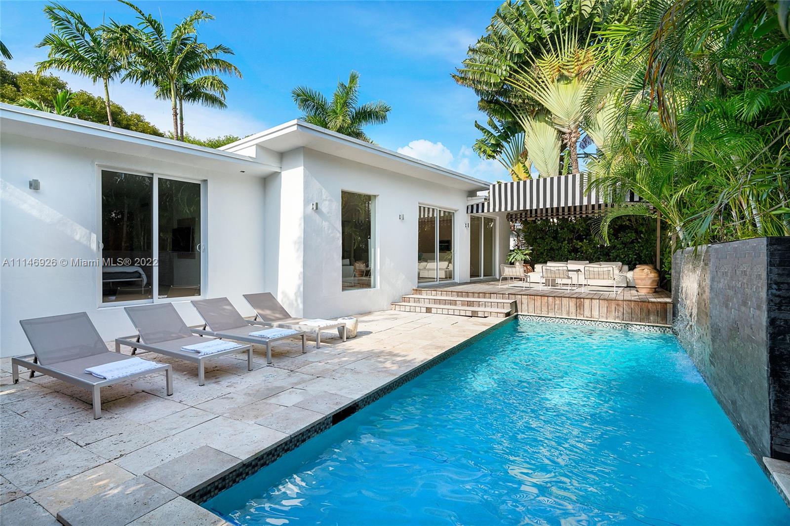Enjoy modern finishes in this renovated 3BR/3BA Villa in the heart of Miami Beach. Features include: Italian oak floor or Marmorino, cooking island kitchen with stainless steel appliances, open living/dining area, principal suite with direct access to the outdoors, home automation lighting system, large backyard w/ heated saltwater pool with cascade waterfall, wooden deck, outdoor dining area, lush high hedges for ultimate privacy. This villa offers the best of Italian design and manufacture. Every detail is tailor-made by Italian artisans with a meticulous choice of materials.