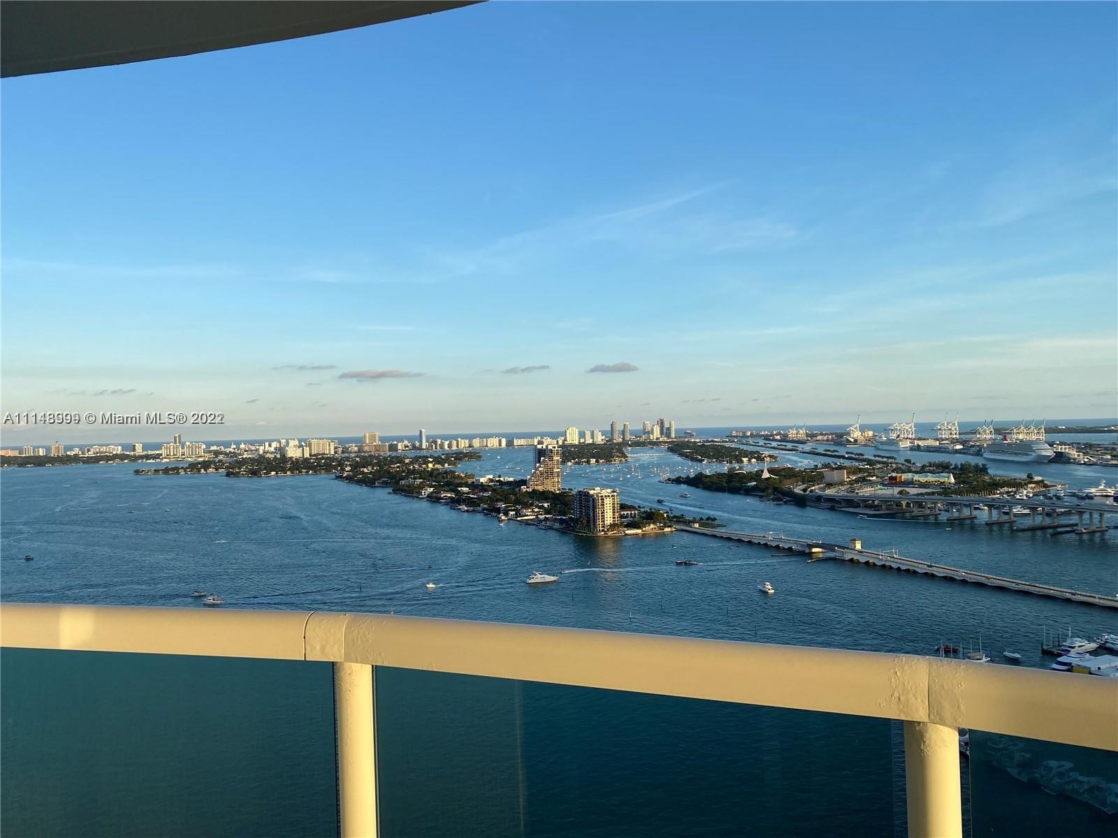 Four large balconies facing the Bay, amazing views of the Miami Bay, Beach and City, across from Margaret Pacepark, close to supermarkets, cafes, and restaurants.  Best line in the building with direct views of the bay.