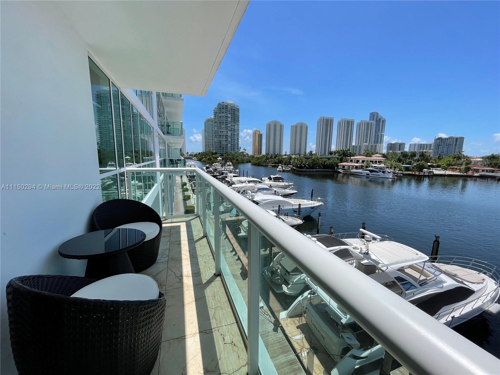 A BOATERS DREAM-ONE OF A KIND TURNKEY FULLY FURNISHED UNIT W/DIRECT INTRACOASTAL VIEWS FROM EVERY ROOM,EXPANSIVE TERRACE OVERLOOKING PRIVATE MARINA. 3 BD CONVERTED TO 2 BD W/LARGE LIVING/DINING ROOM(CAN BE CONVERTED BACK TO 3 BD). MANY UPGRADES:MODERN KITCHEN W/ STATE OF THE ART APPLIANCES, MARBLE FLOORS, CALIFORNIA CLOSETS, CUSTOMIZED LIGHT FIXTURES, SMART HOME SYSTEM- SECURITY CAMERA, AC CONTROLLED VIA APP, ELECTRICAL BLINDS, TOTO TOILETS. BRAND NEW ITALIAN FURNITURE INCLUDED. 2 PARKING SPACES ON SAME FLOOR AS UNIT. PRIVATE&LUXURY BOUTIQUE BUILDING IN SUNNY ISLES ON THE INTRACOASTAL- INFINITY POOL, SNACK BAR, HOT TUB, SAUNA& STEAM ROOMS, TENNIS COURTS, FITNESS CENTER W/AEROBIC & YOGA ROOMS,MASSAGE ROOMS,CABANAS,CONCIERGE, DRY &WET MARINAS, BUSINESS CENTER, 24 HR VALET, LOBBY ATTENDED.